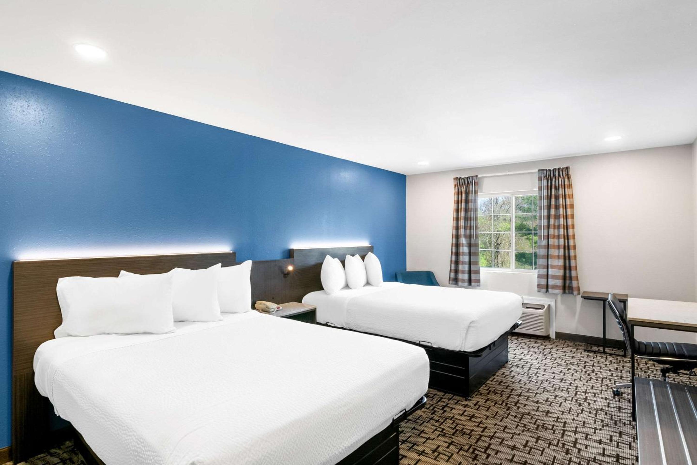 Queen Room with Two Queen Beds - Photo 1
