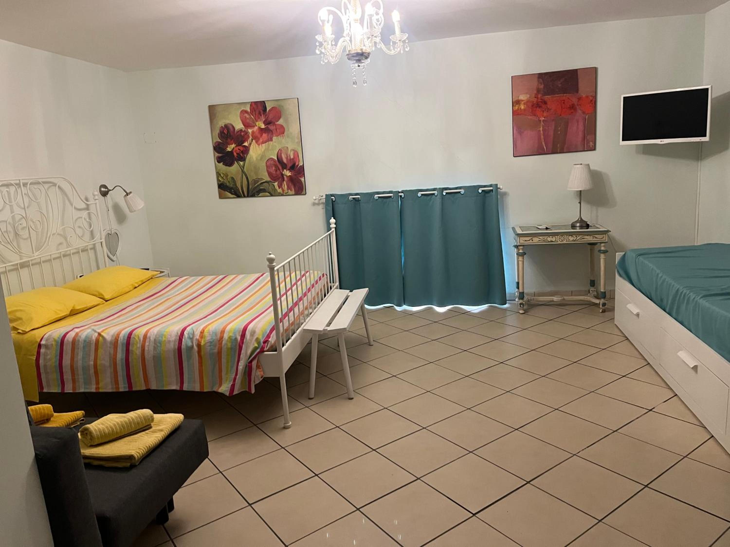 Quadruple Room with Private Bathroom