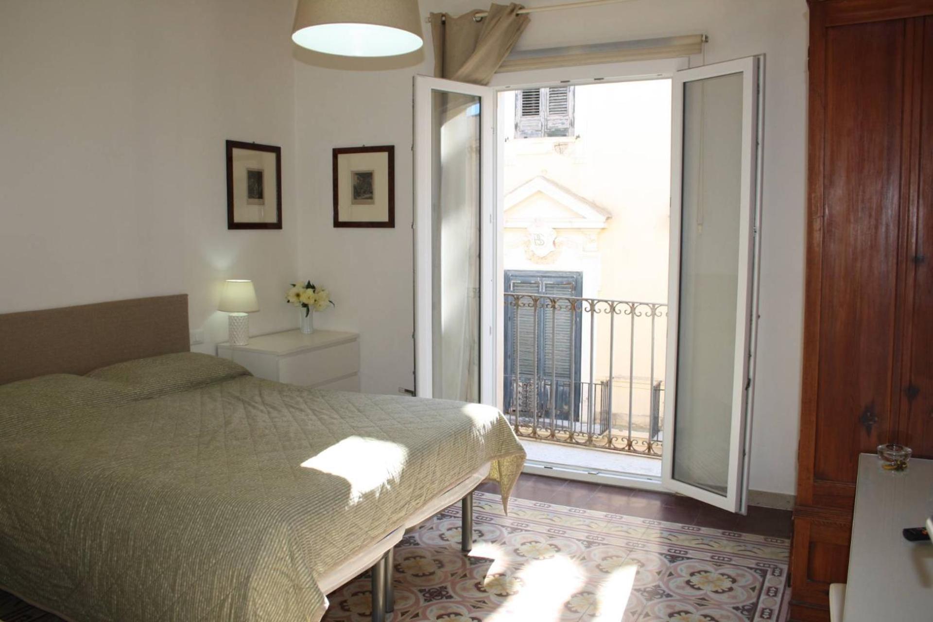 One-Bedroom Apartment with Balcony and City View photo 2