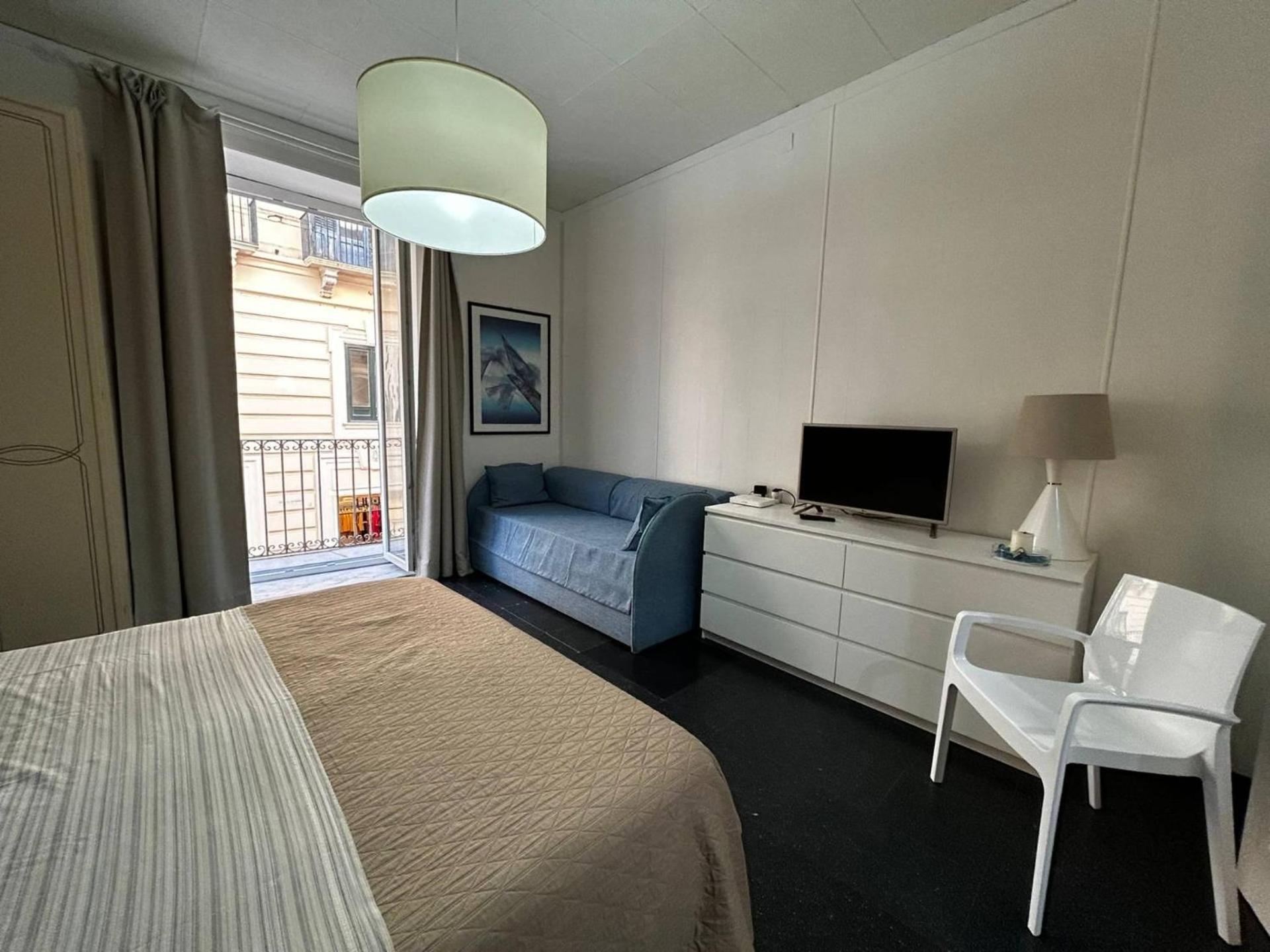 One-Bedroom Apartment with Balcony and City View photo 1