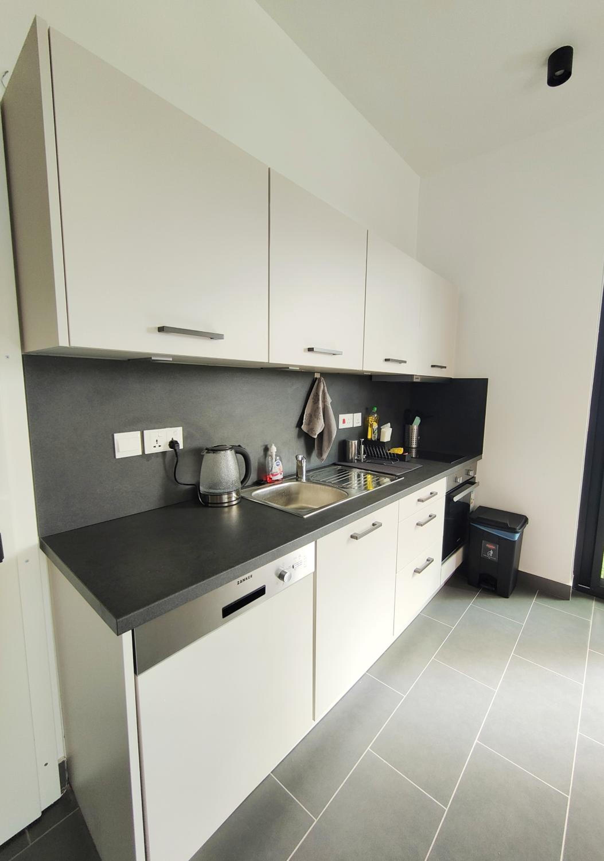 Three-Bedroom Apartment with Balcony photo 2