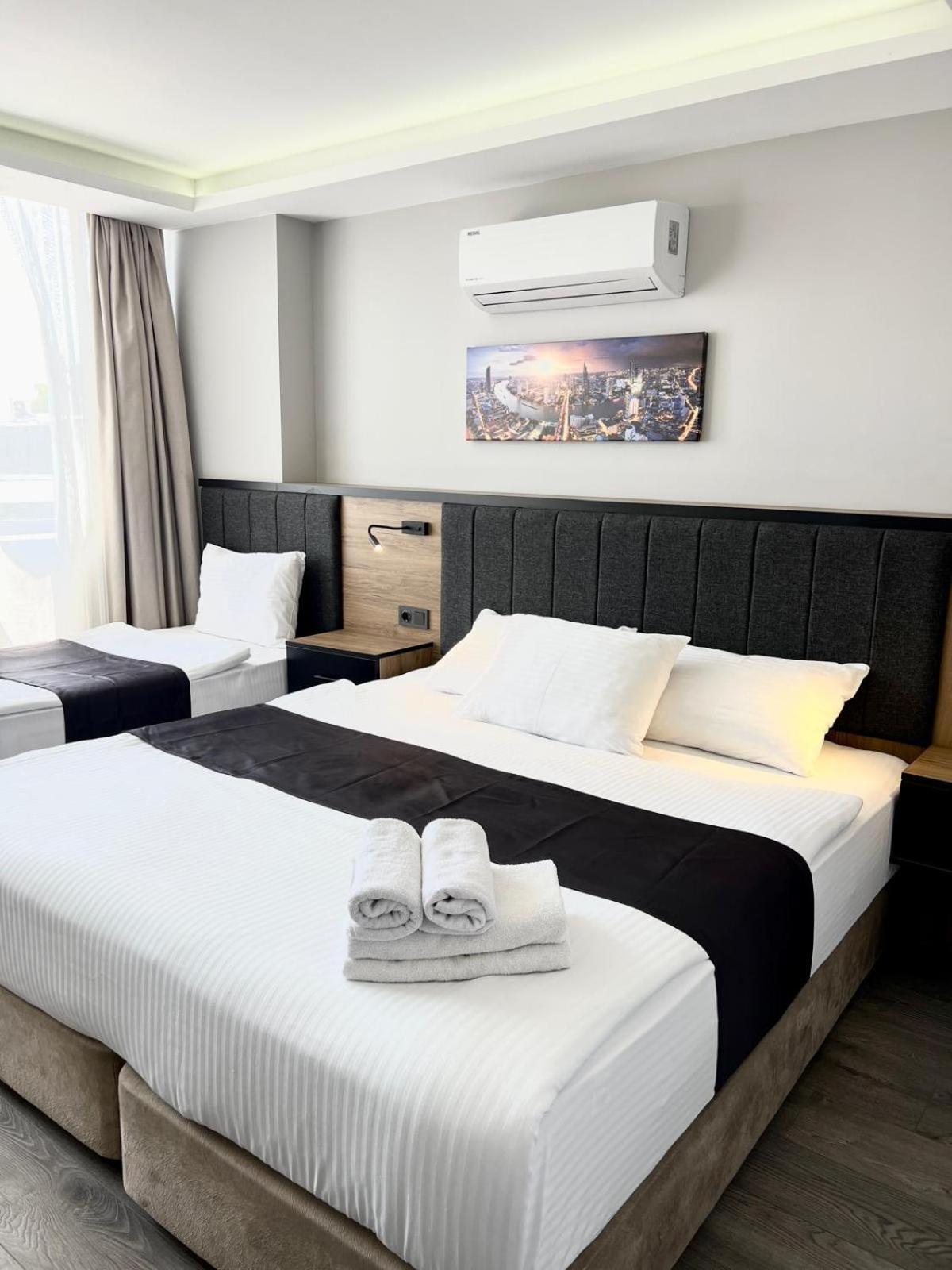Basic Triple Room photo 3