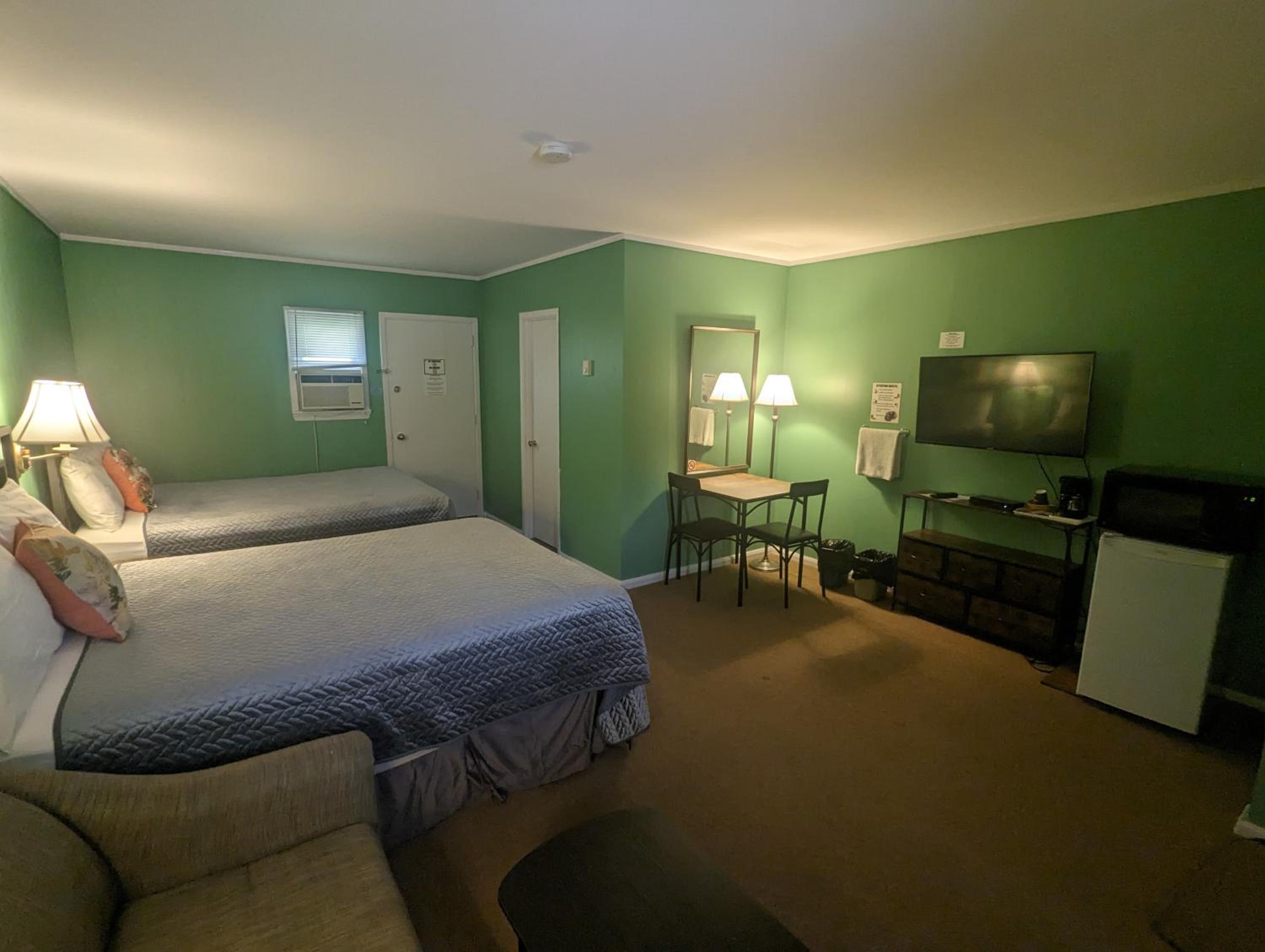 Deluxe Queen Room with Two Queen Beds - Photo 1