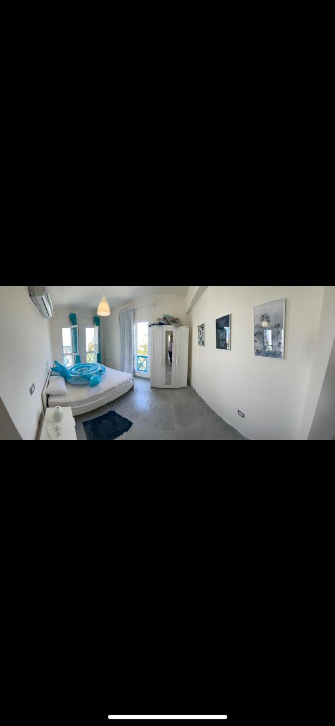 Three-Bedroom Apartment photo 2