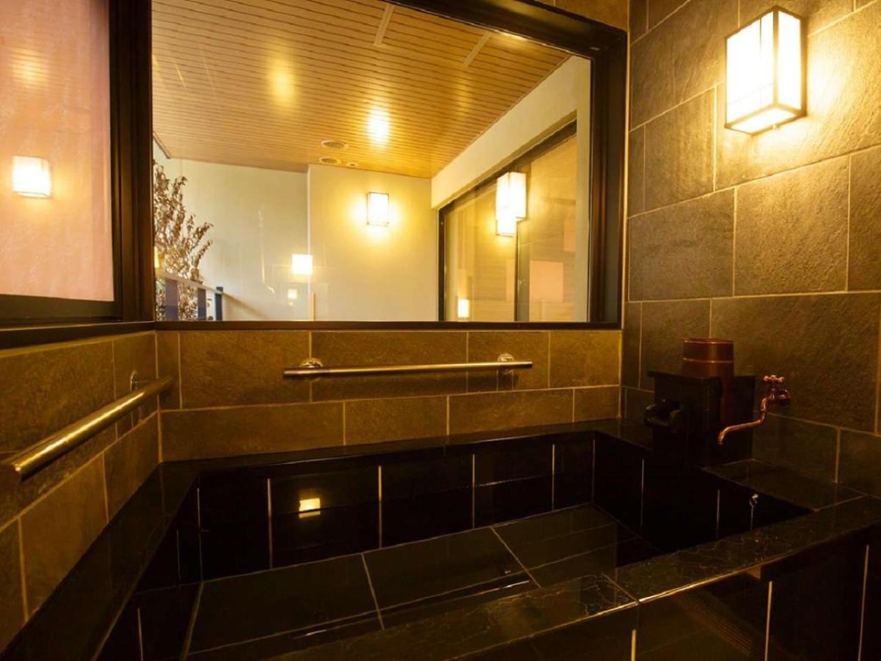 Quadruple Room with Semi Open-Air Bath - Photo 4