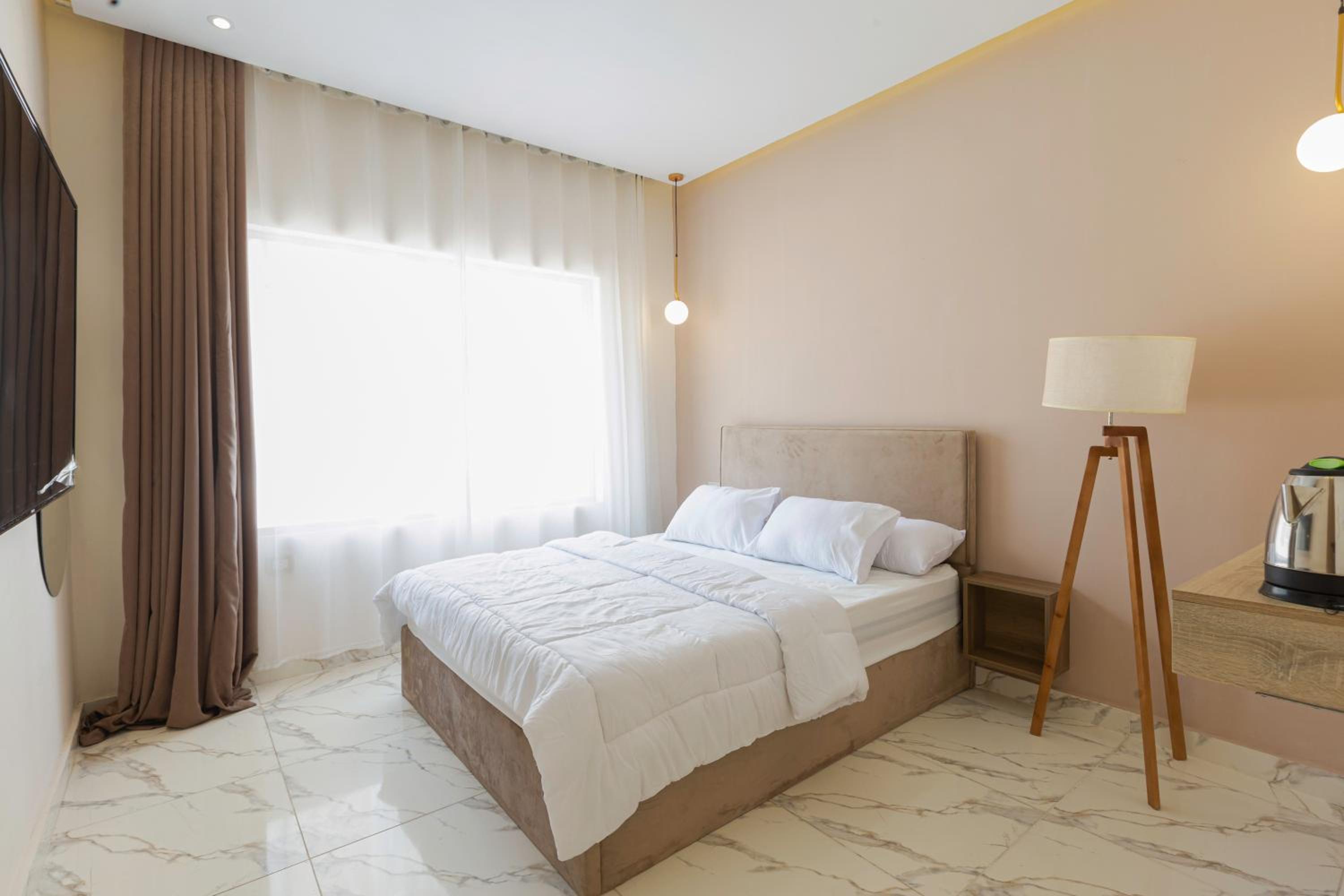 Chambre Double Deluxe - Vue Latérale sur Mer