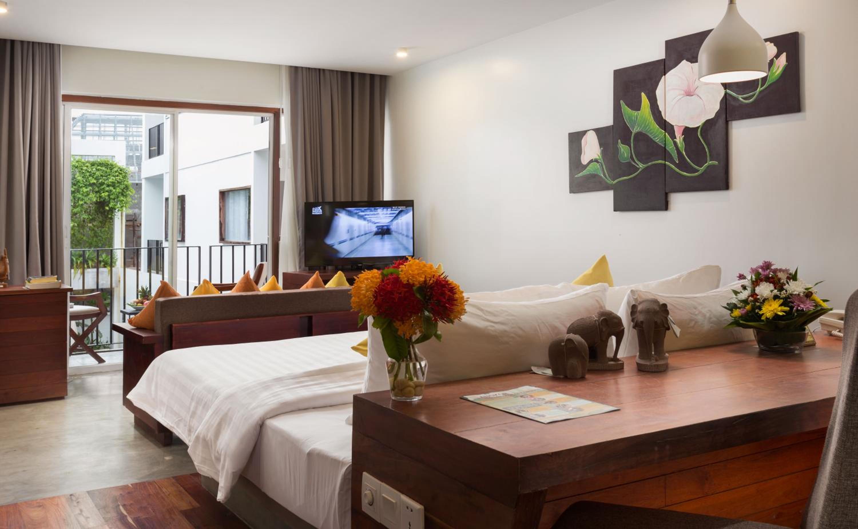 Junior King Suite Pool View with Balcony, Sofa, and Bathtub