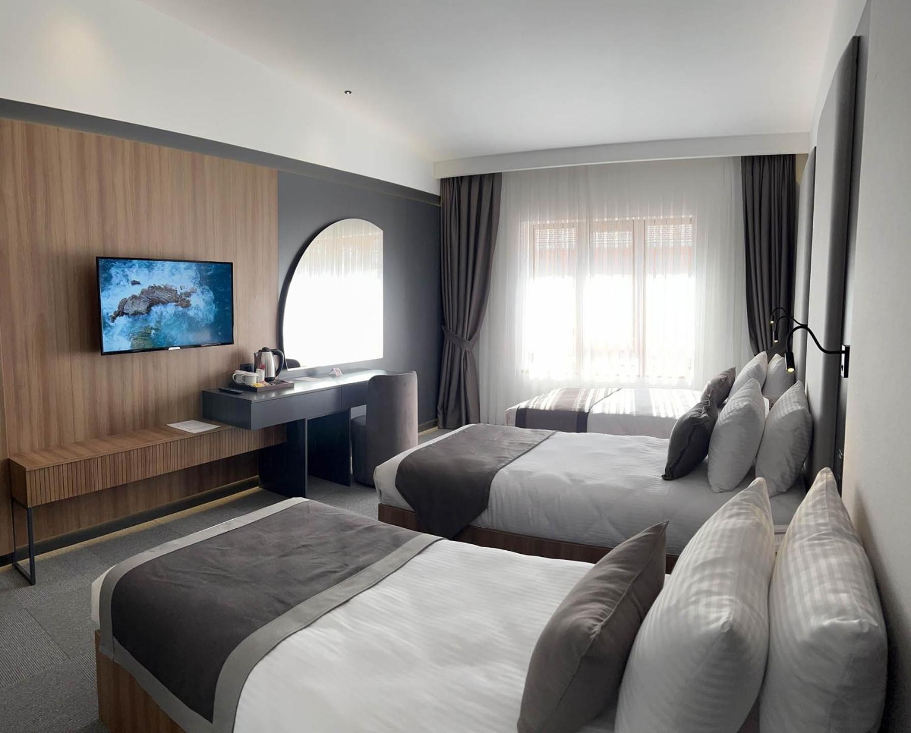 Premium Quadruple Room - Photo 12