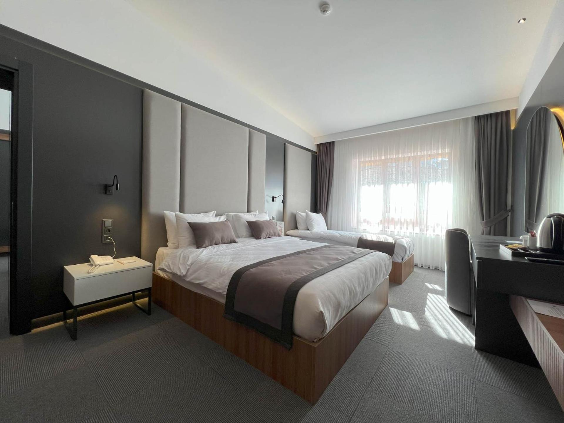 Premium Quadruple Room - Photo 14