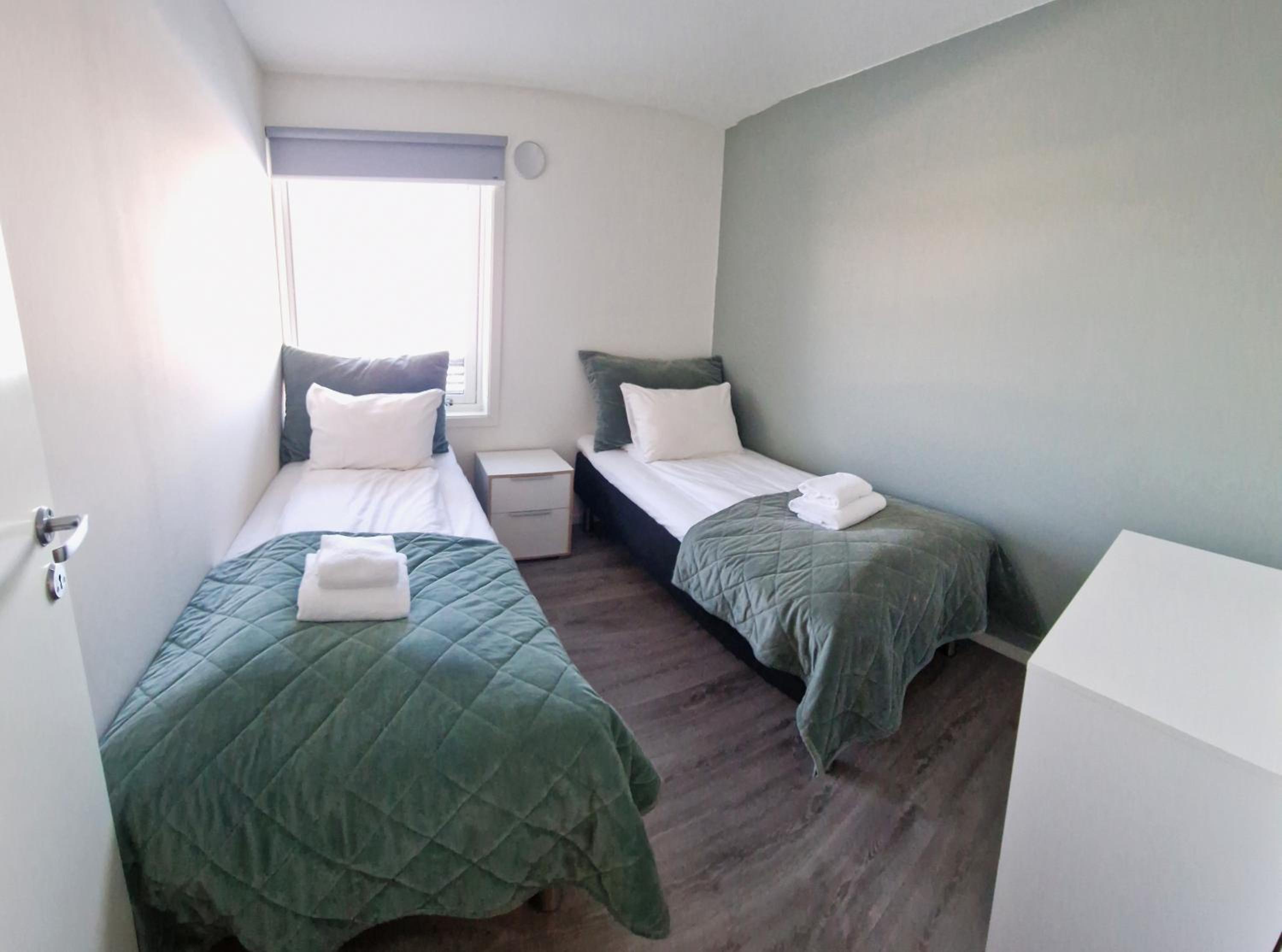 Three-Bedroom Apartment - Photo 11