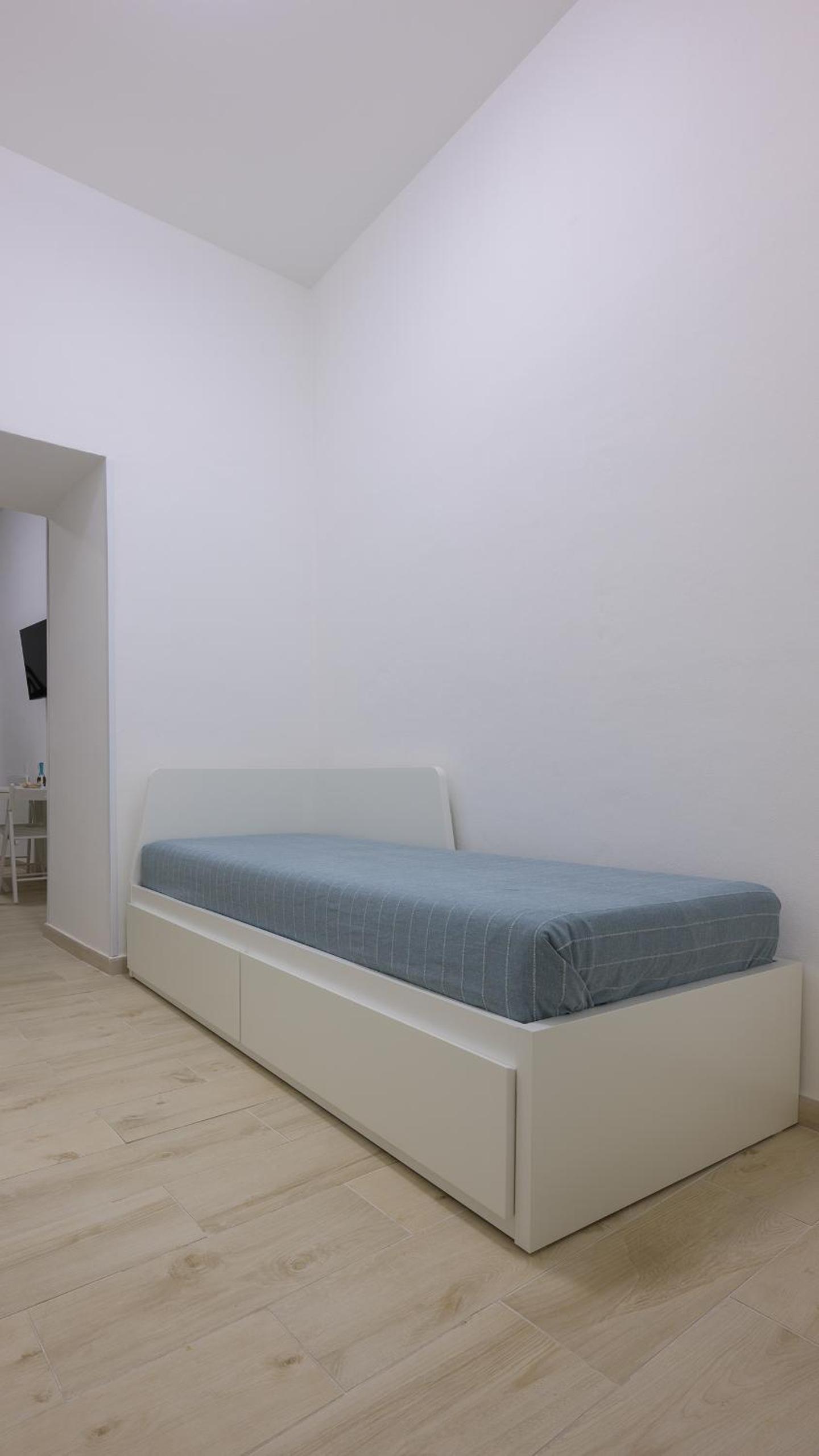 Quadruple Room with Private Bathroom
