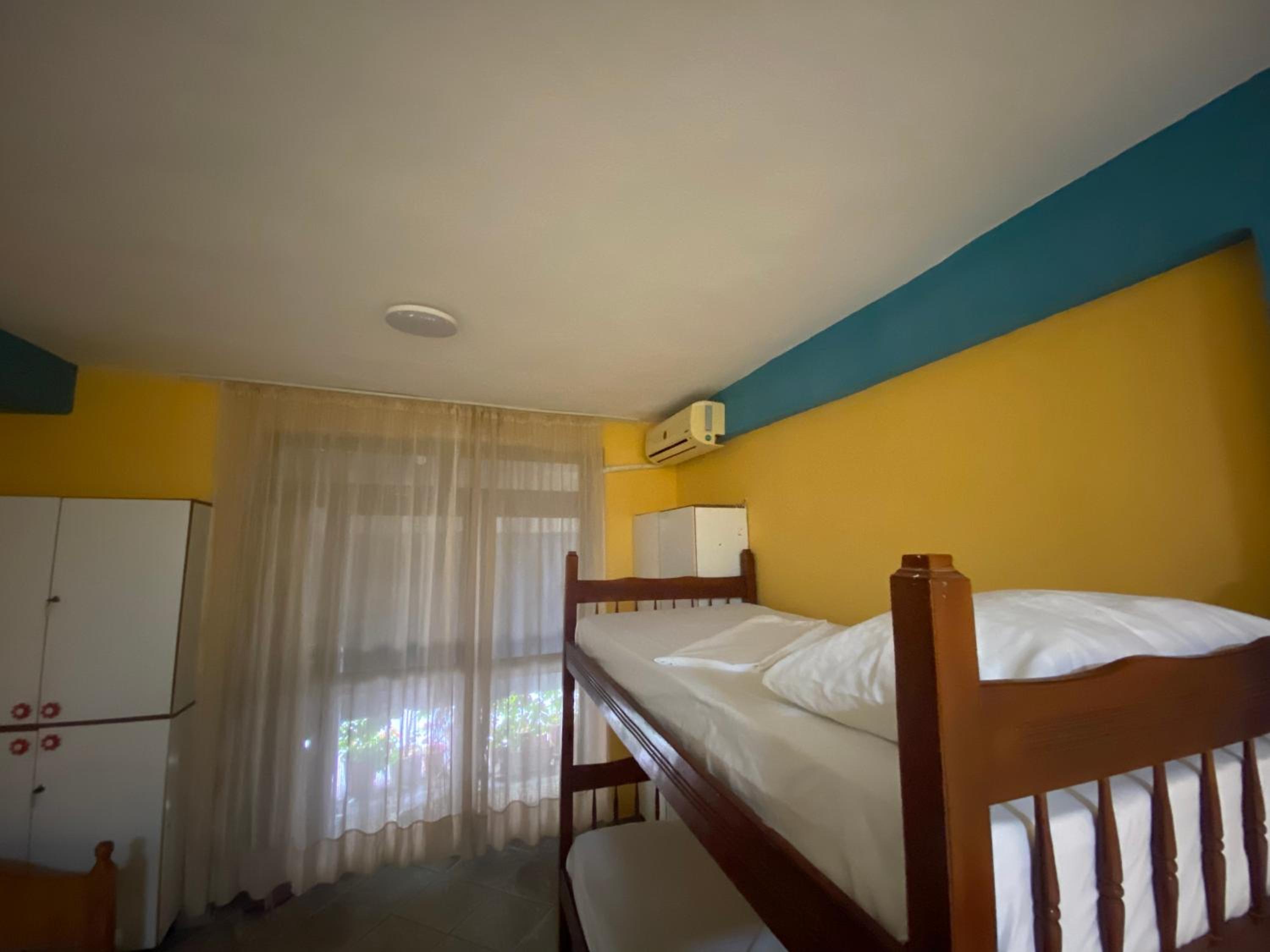 Single Bed In Mixed Dormitory Room
