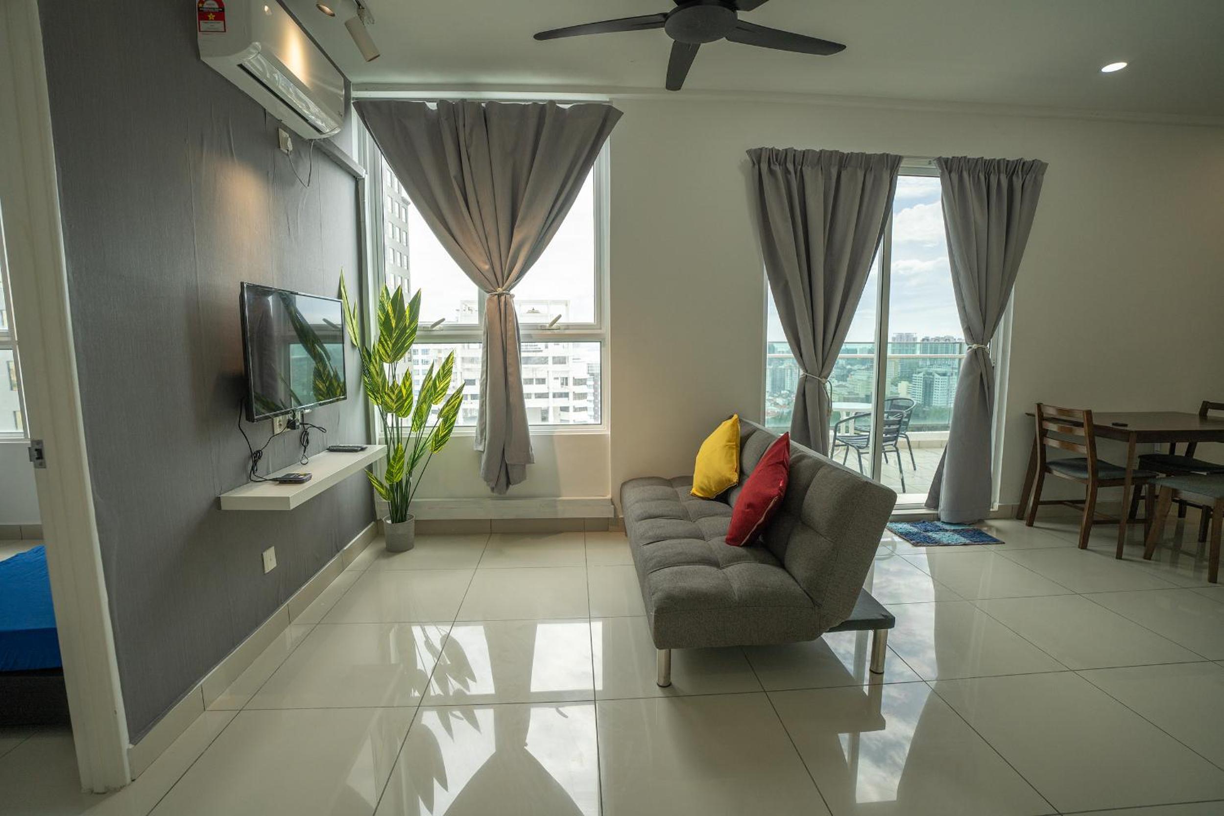 One-Bedroom Apartment with Balcony and City View