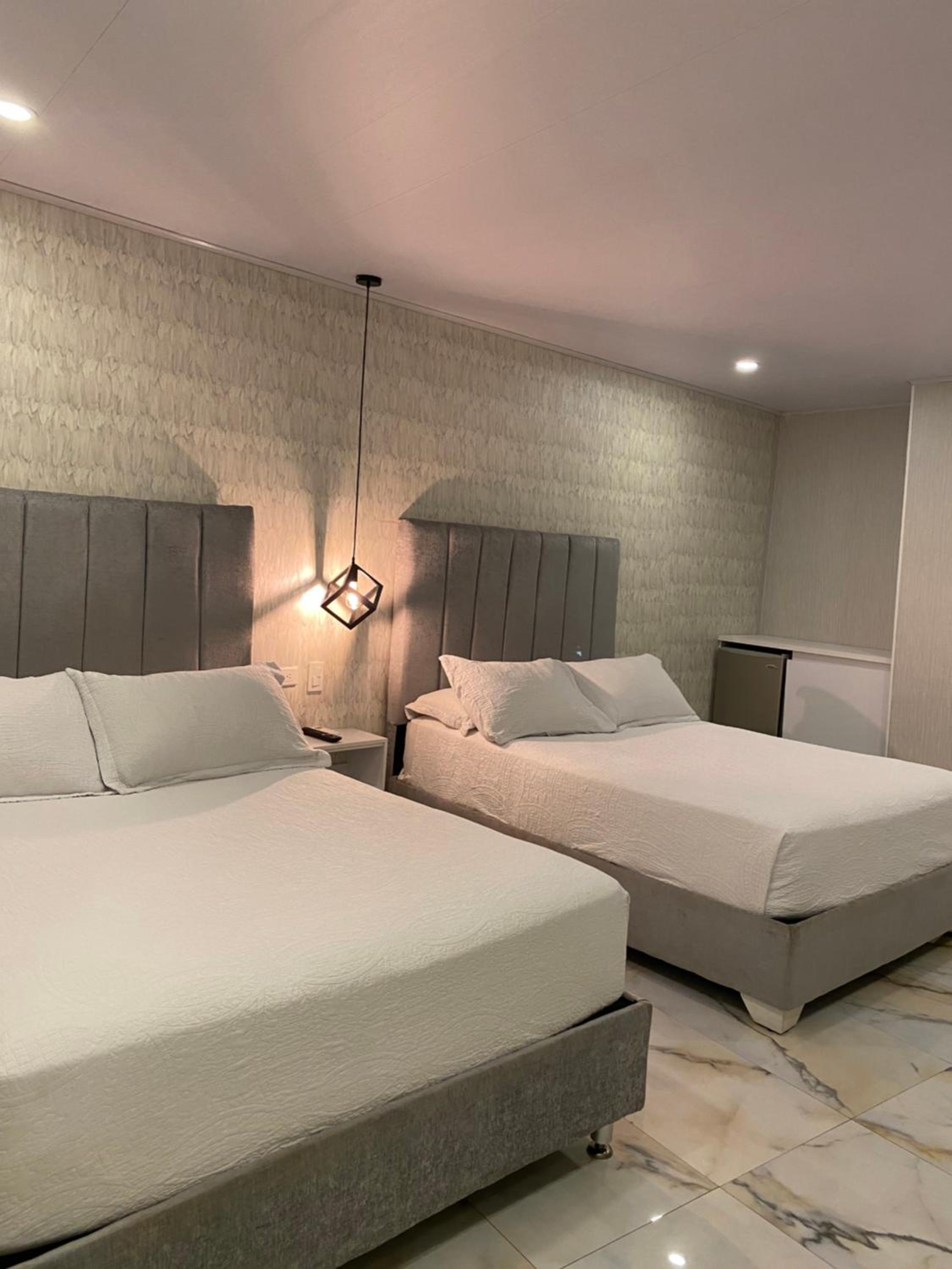 Quadruple Room with Private Bathroom - Photo 1