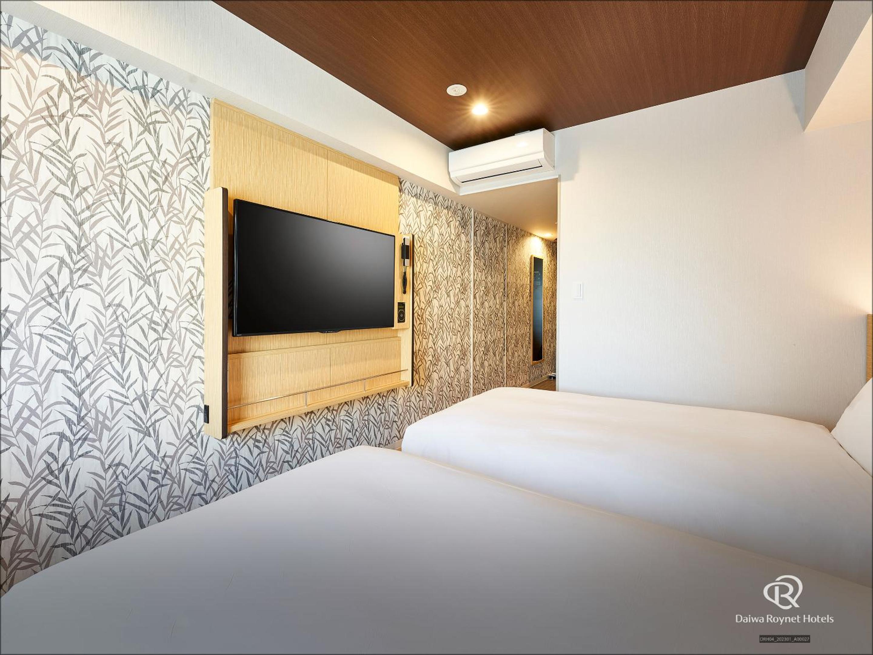 Economy Twin Room - Non-Smoking - Photo 11
