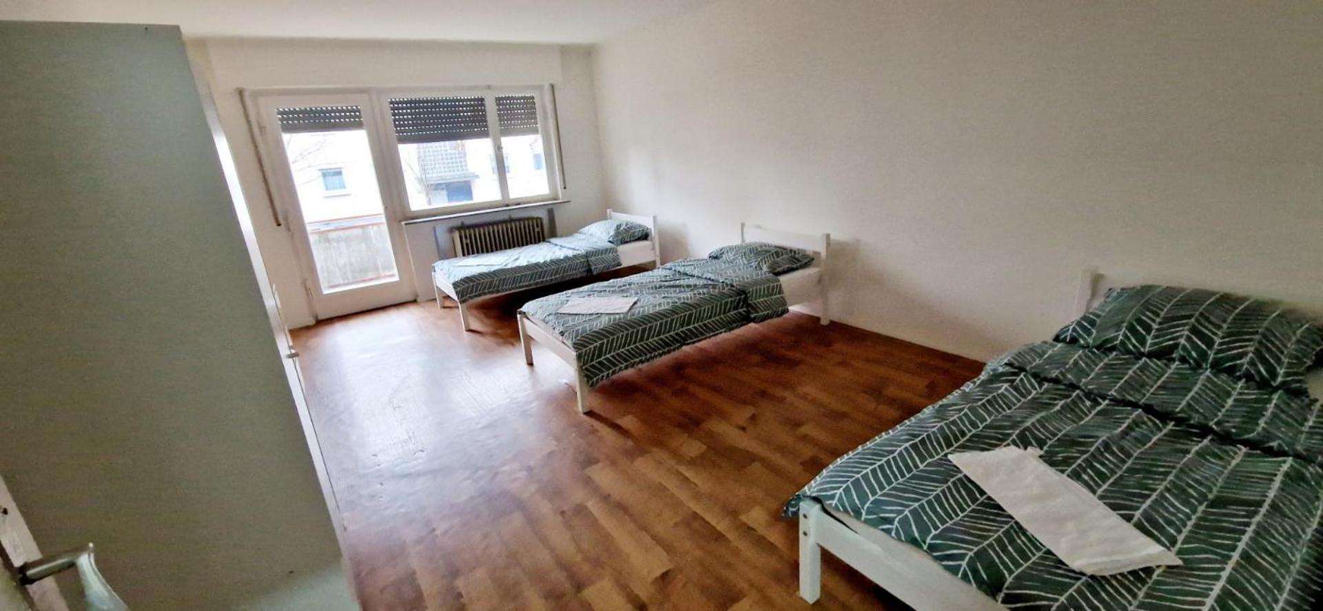 Three-Bedroom Apartment With Balcony photo 2