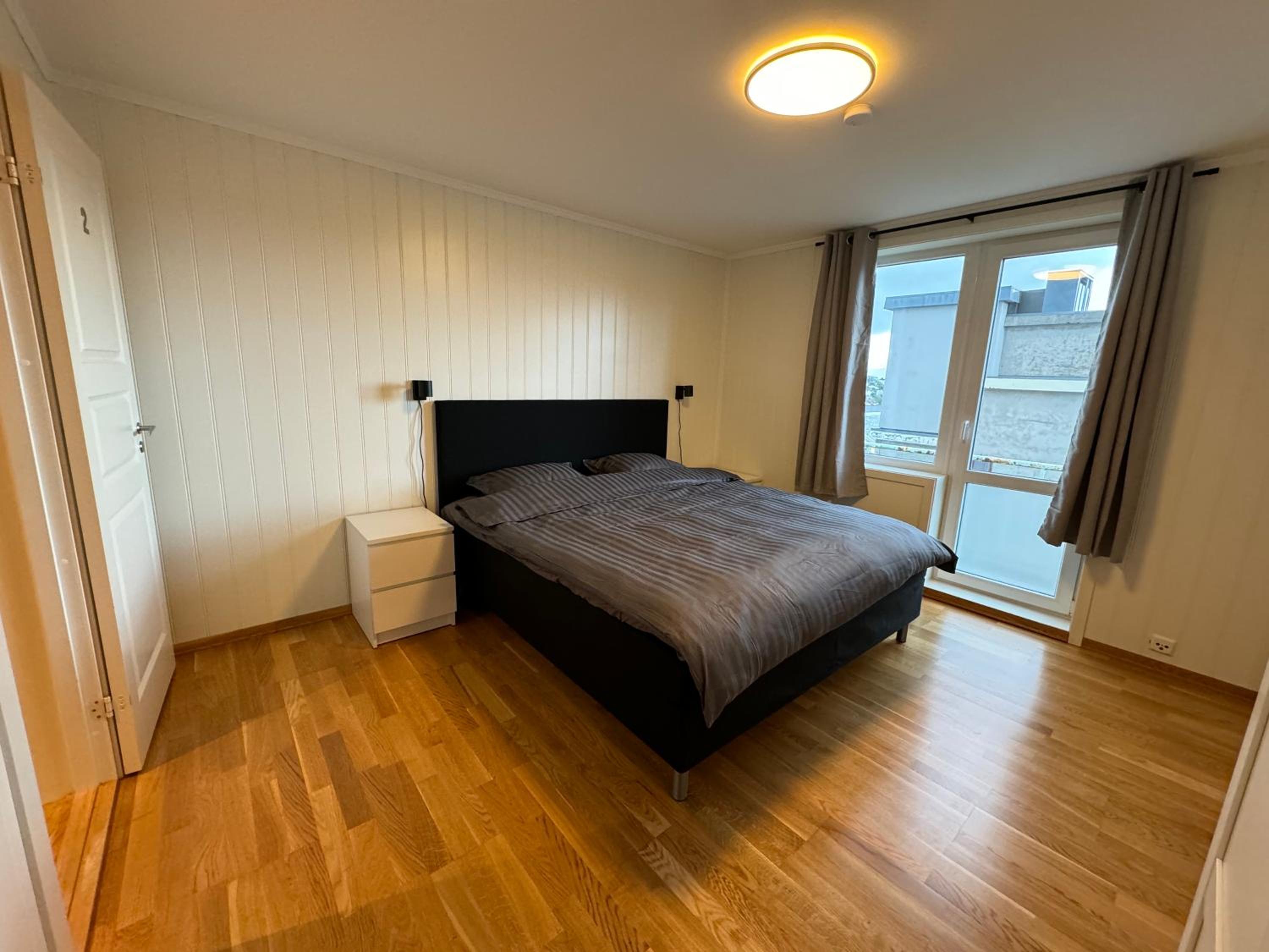 Three-Bedroom Apartment with Balcony photo 1