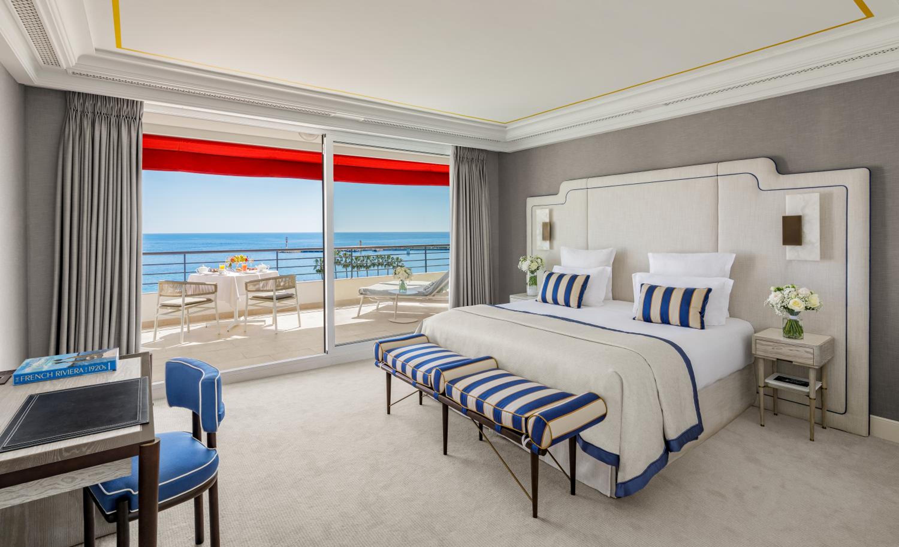 hotel room with a view of the beach and ocean