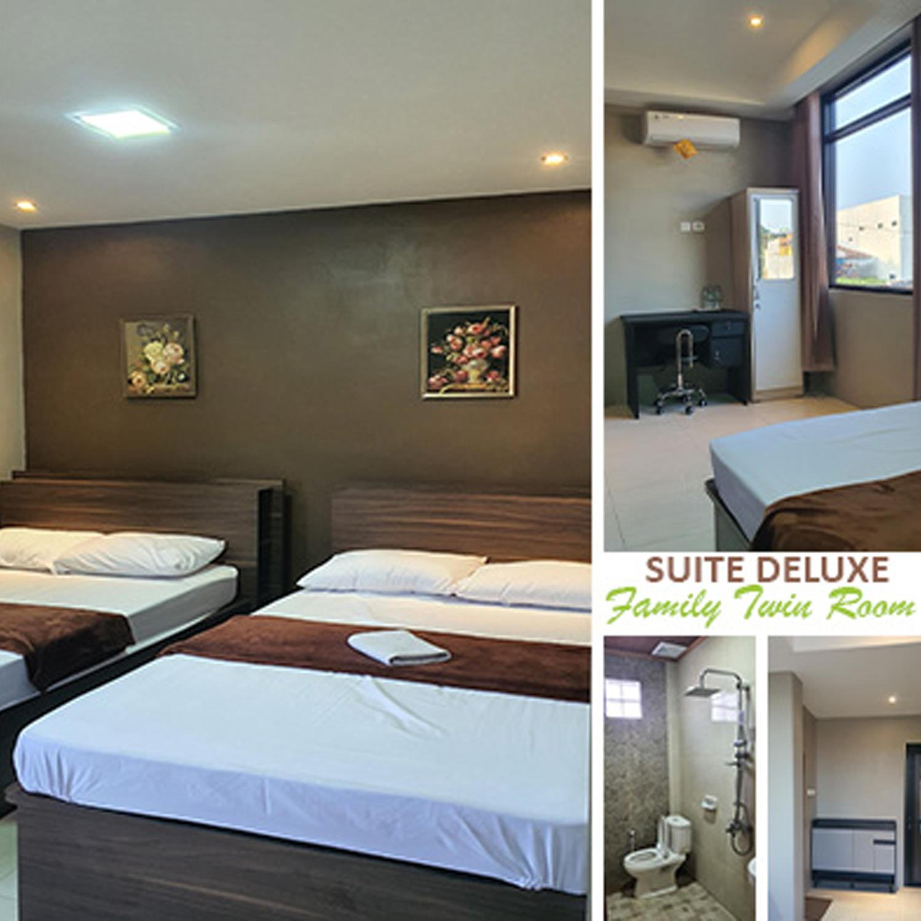 Deluxe Queen Room with Two Queen Beds photo 1