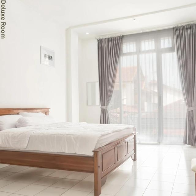 Deluxe Double Room with Balcony - Photo 1