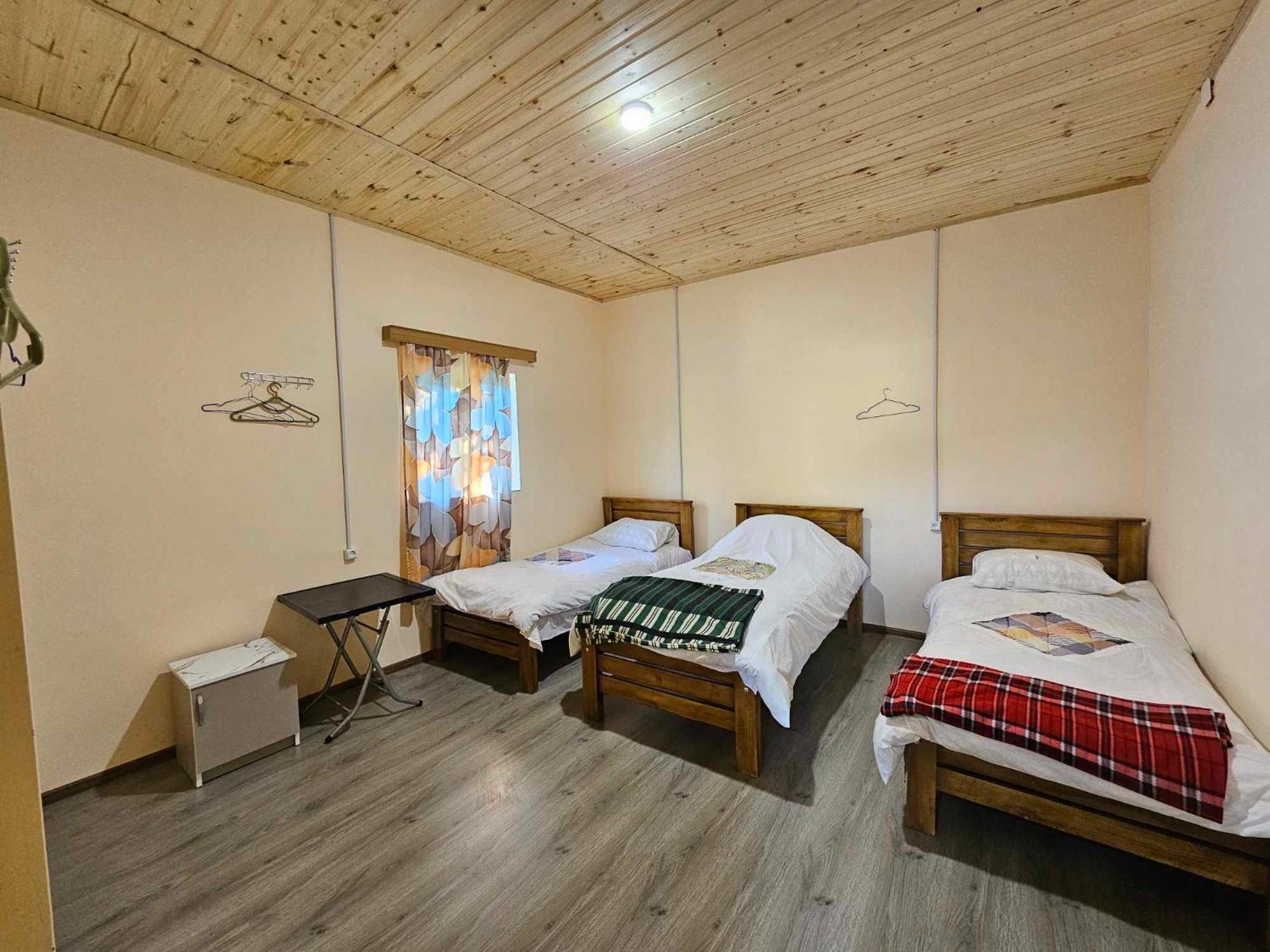 Basic Triple Room With Shared Bathroom photo 3