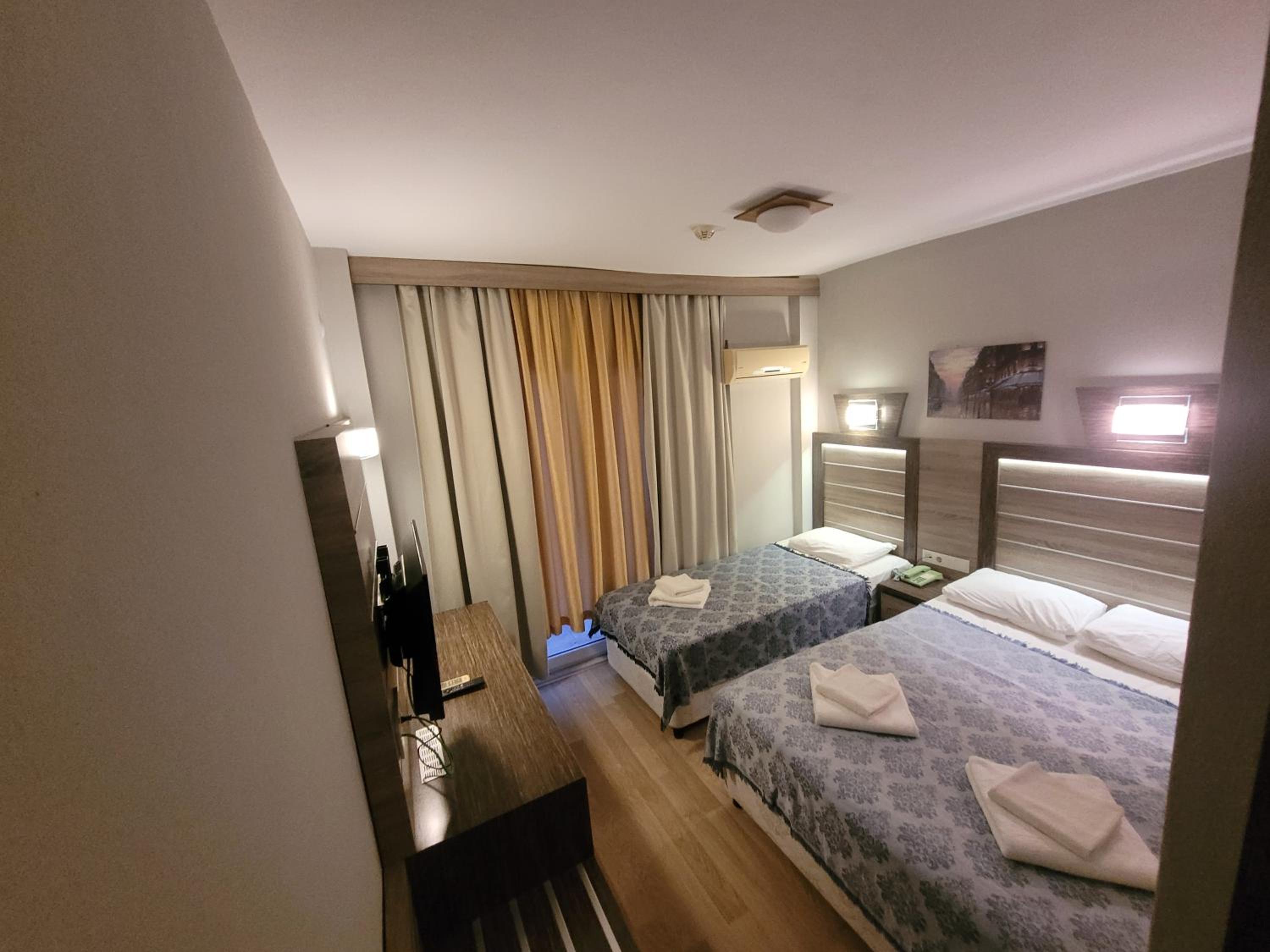 Standard Triple Room - Photo 10