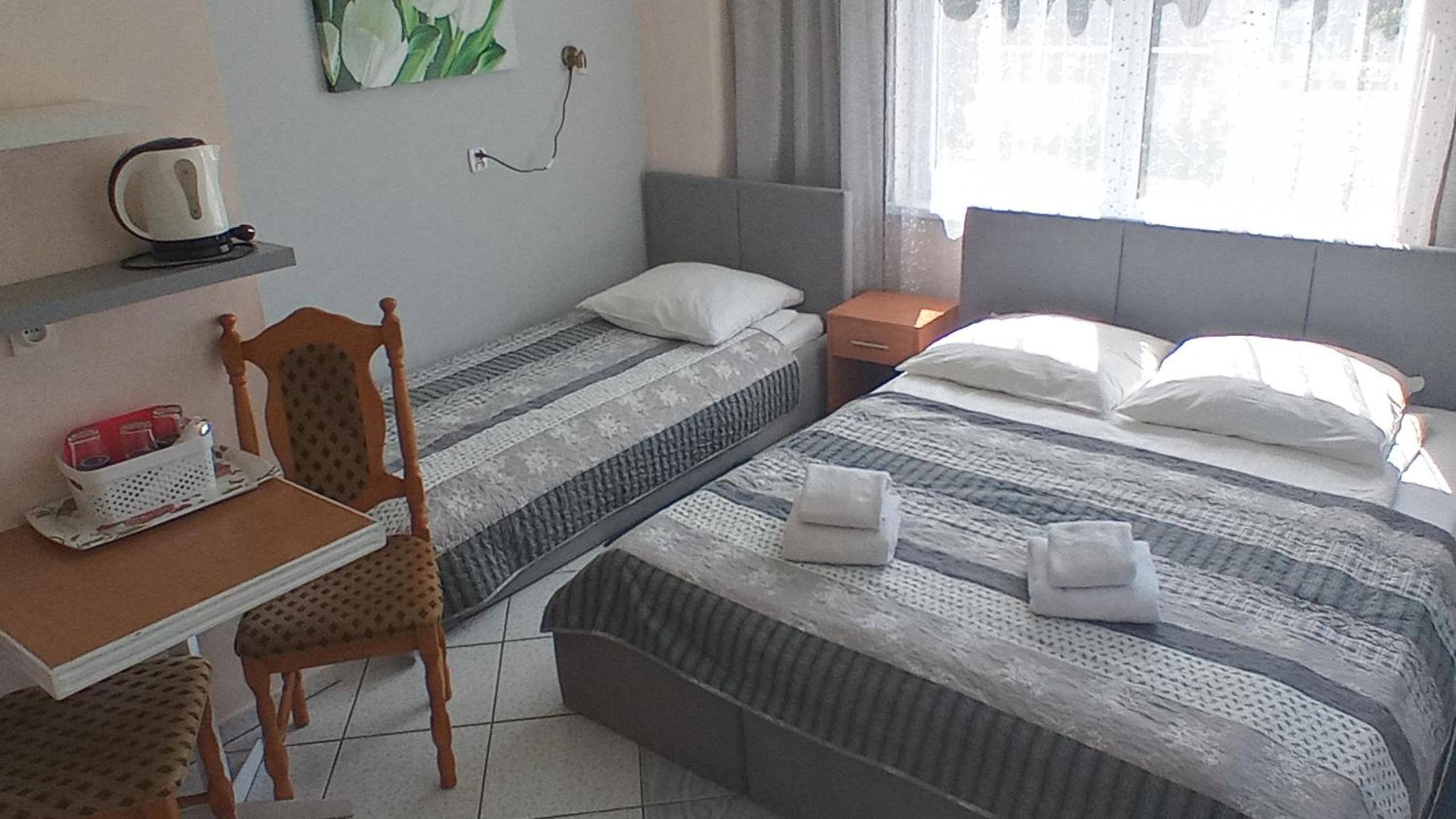 Basic Triple Room photo 2