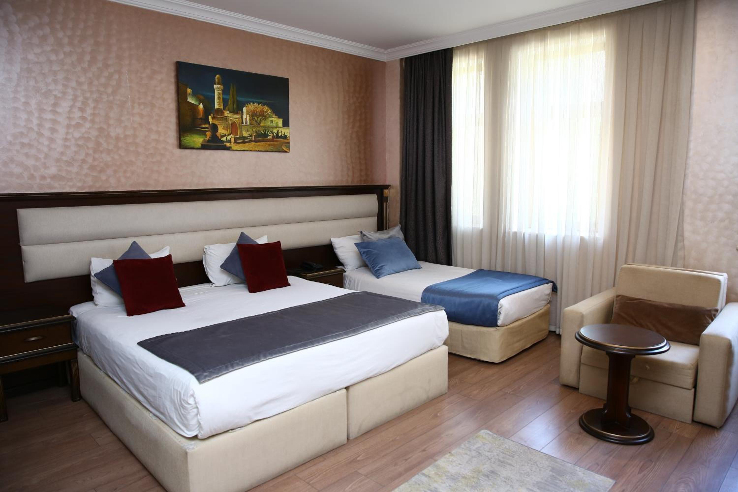 Deluxe Triple Room