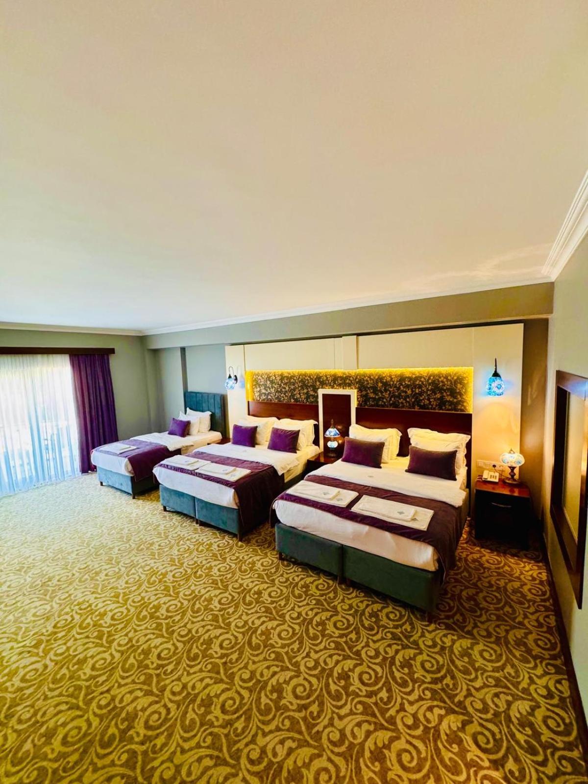 Deluxe Quadruple Room - Photo 6