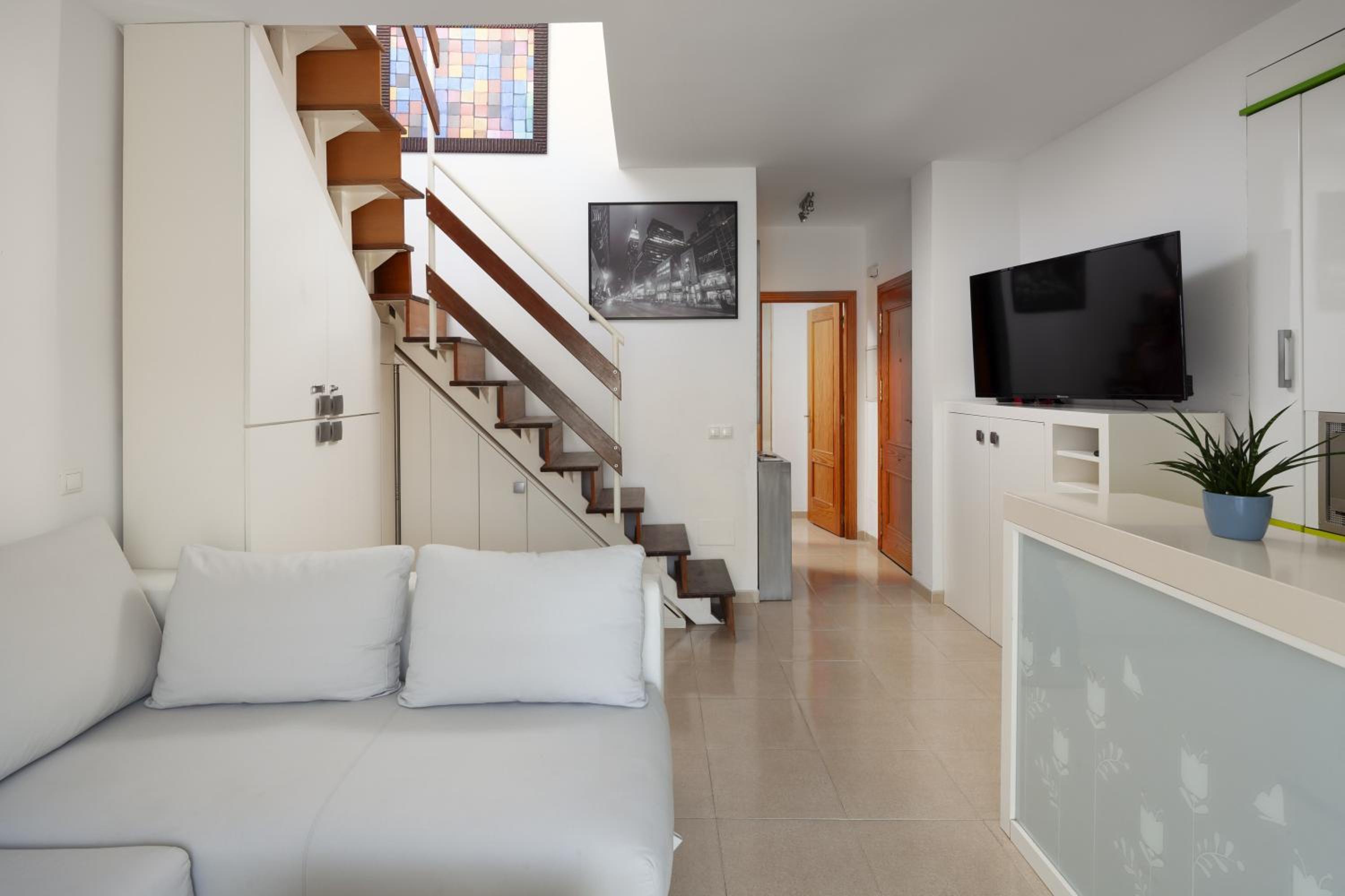 Apartamento de un dormitorio superior con balcón