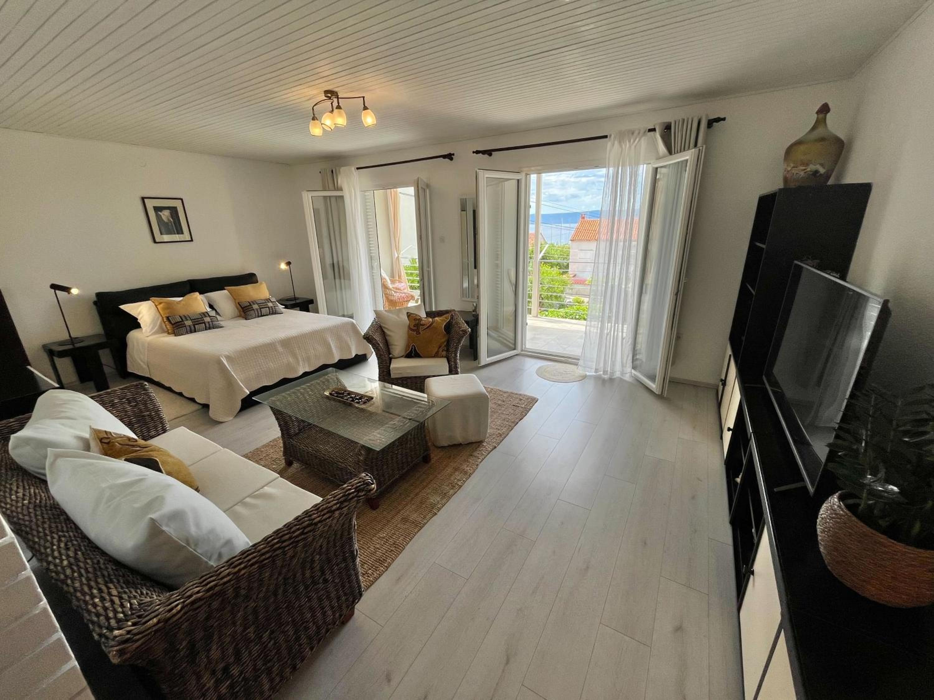 One-Bedroom Apartment with Balcony and Sea View