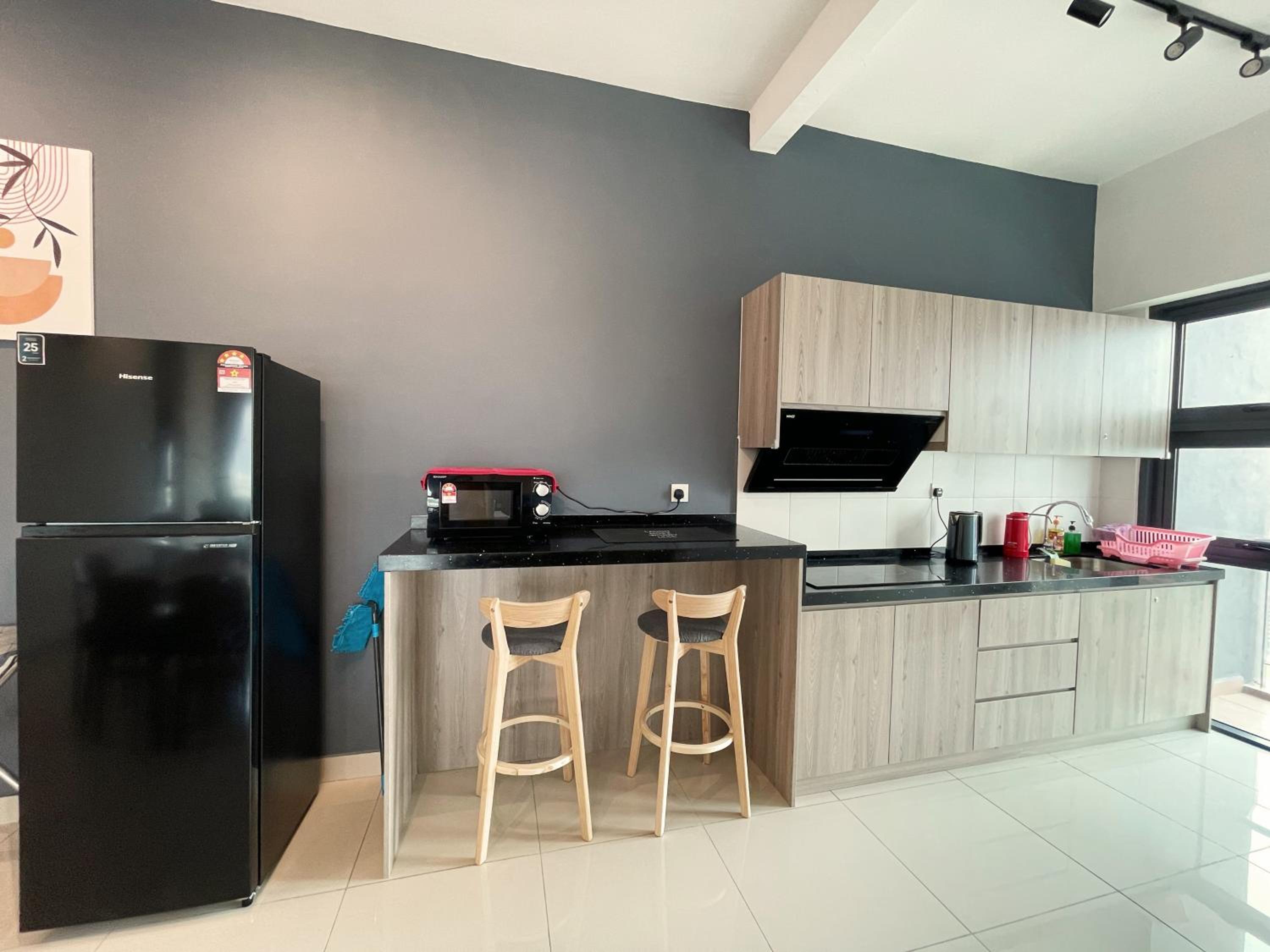 Three-Bedroom Apartment - Photo 2
