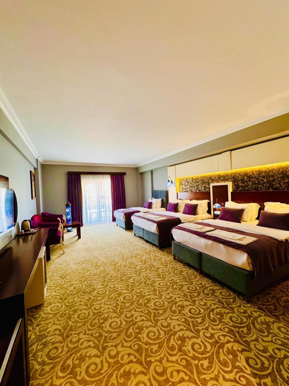 Deluxe Quadruple Room - Photo 1