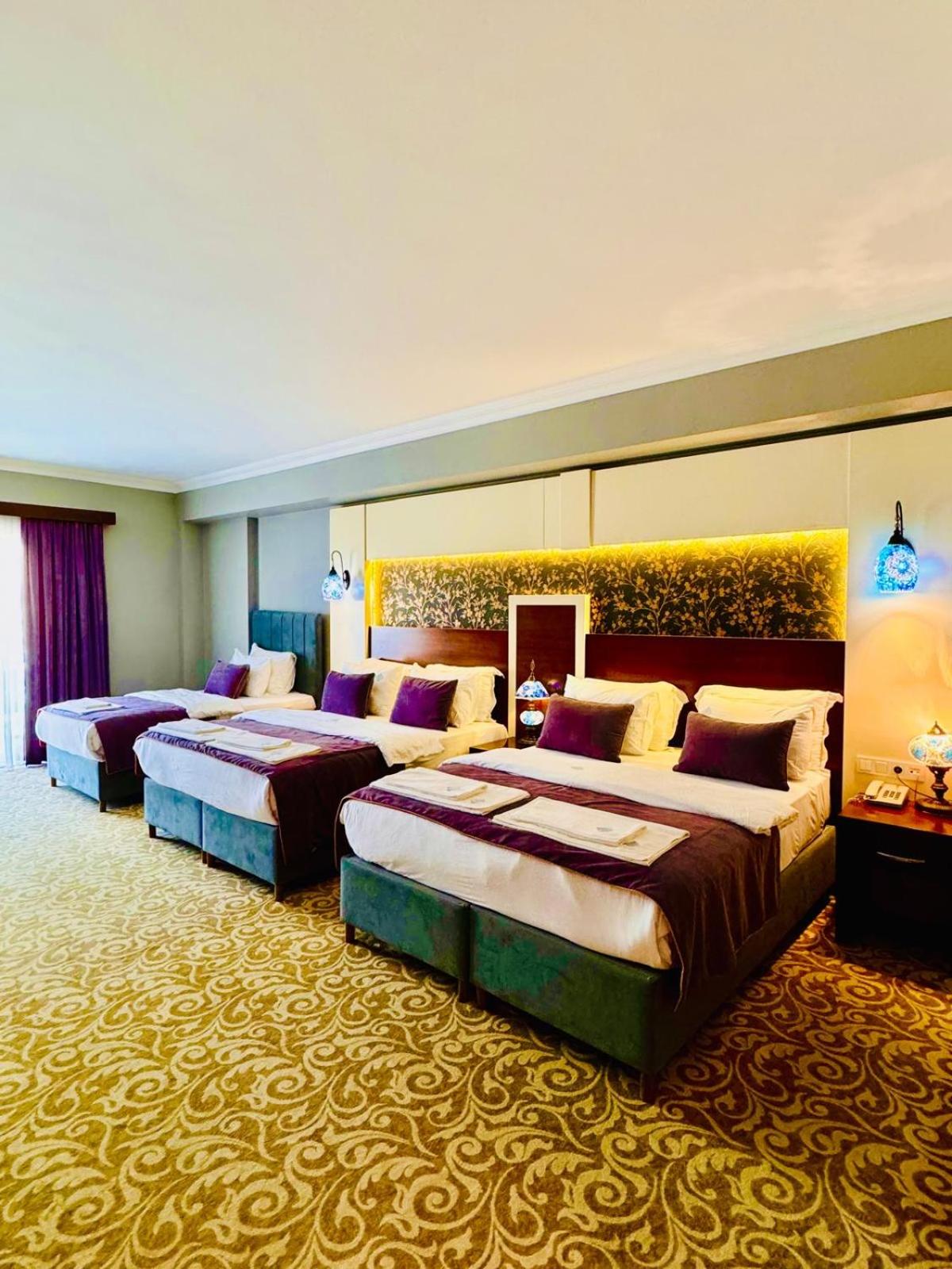 Deluxe Quadruple Room - Photo 5