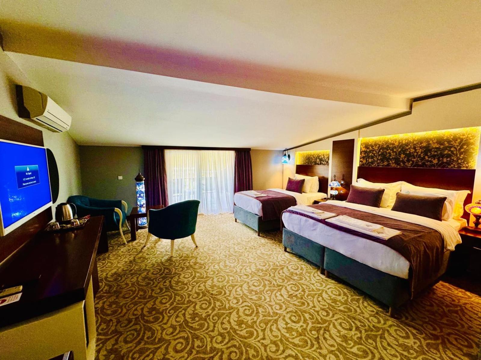 Deluxe Triple Room - Photo 1