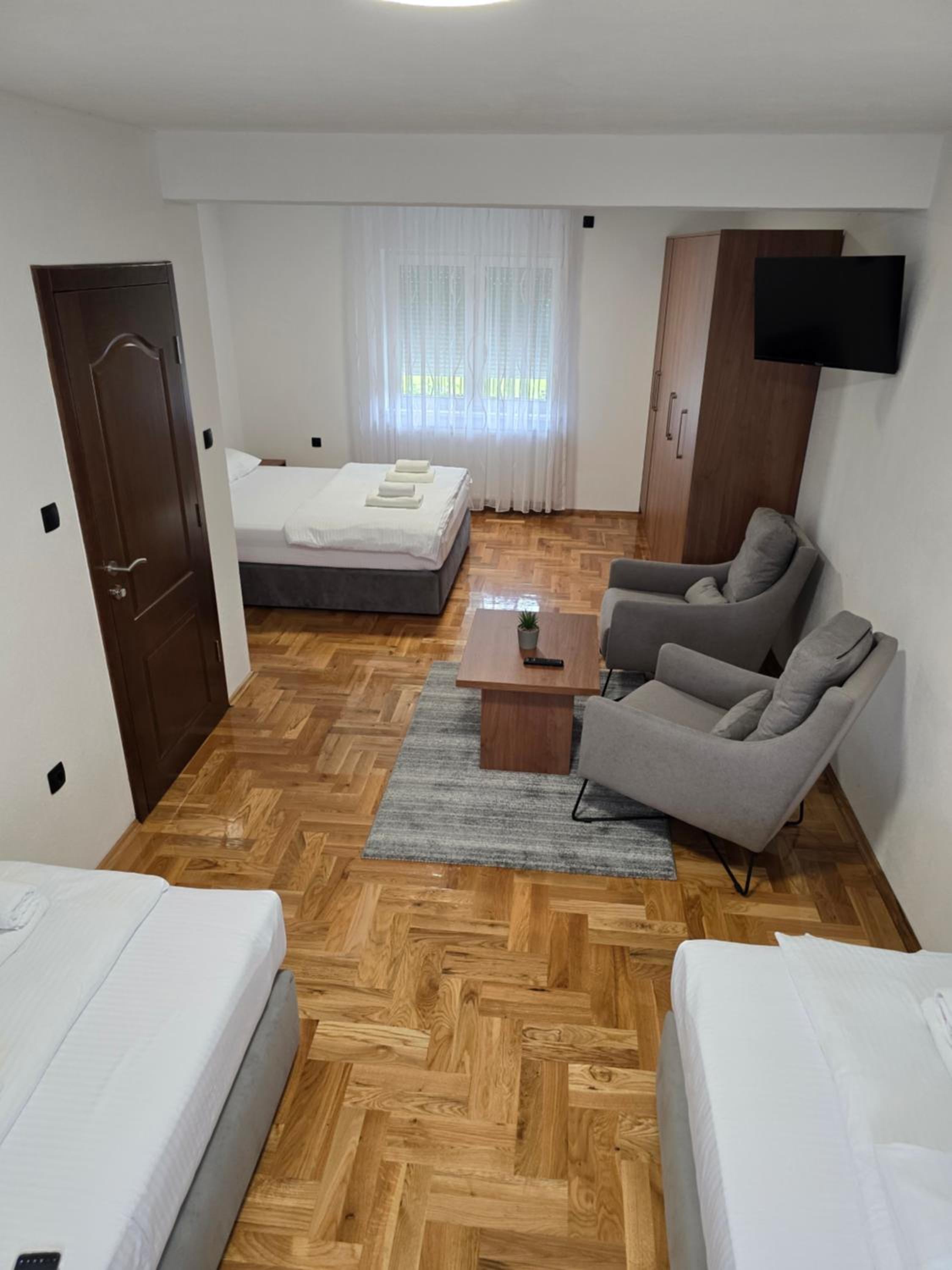 Three-Bedroom Apartment photo 1
