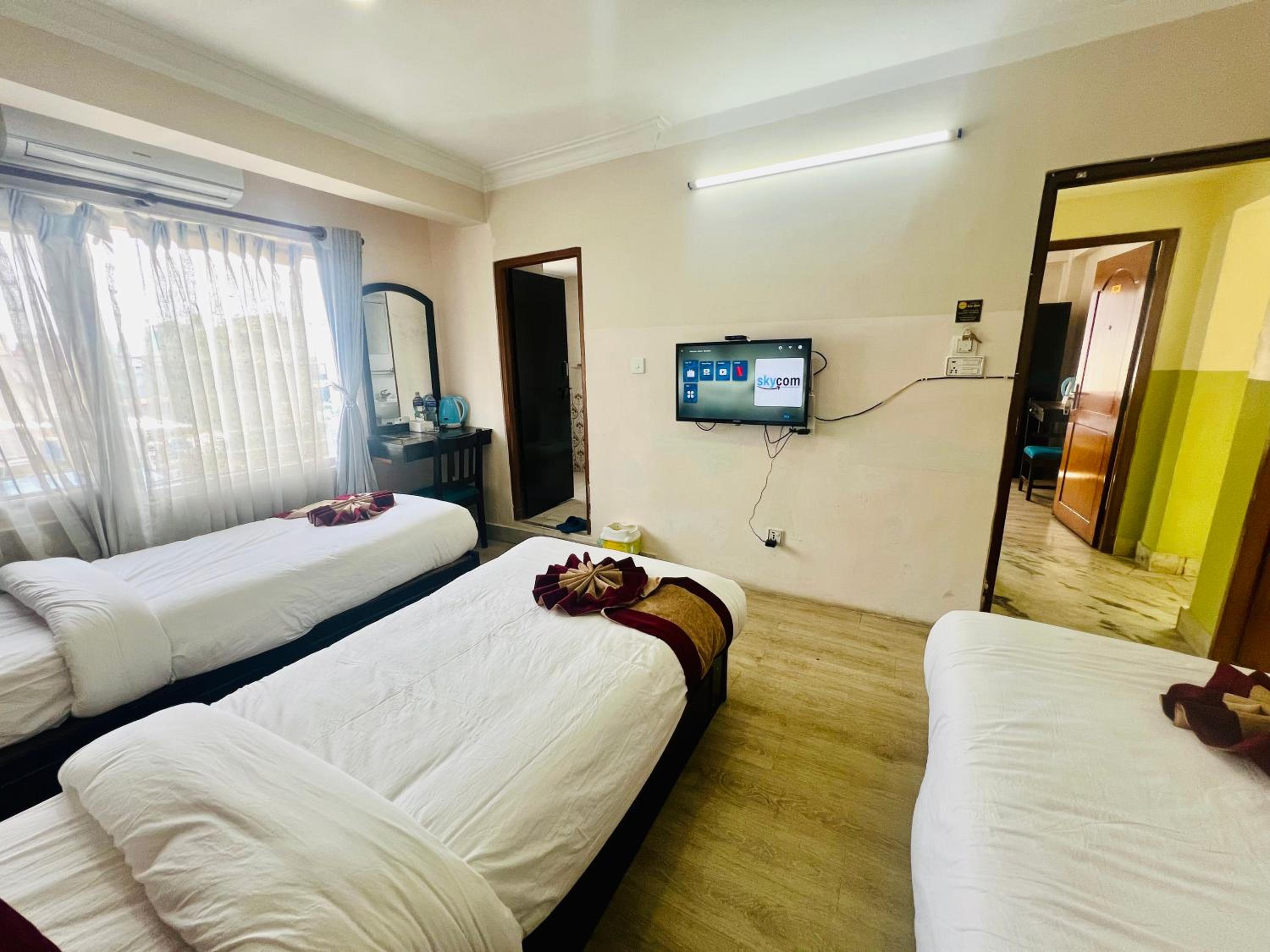 Deluxe Triple Room