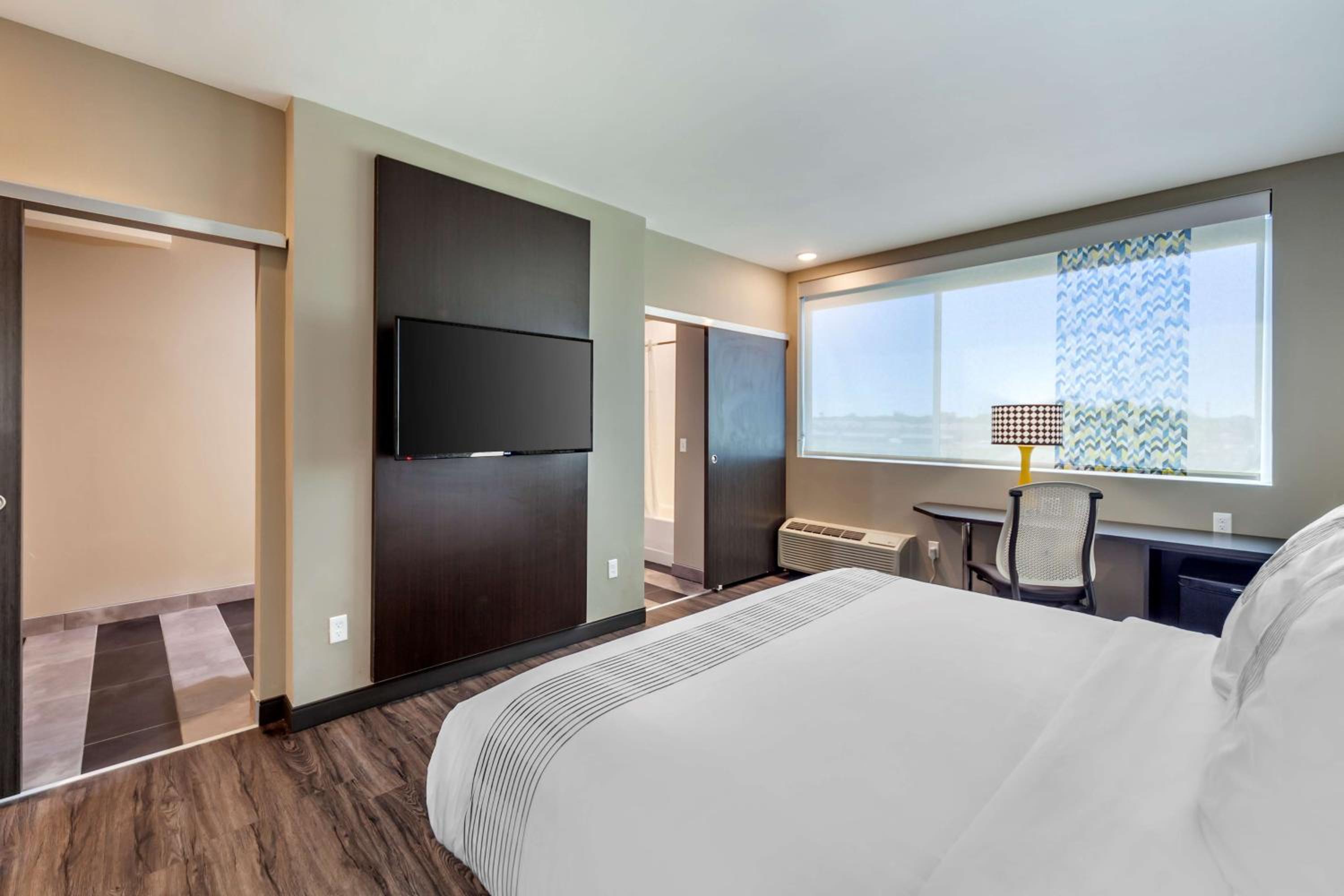 Larger King Room with Mobility Accessible Roll-In Shower - Photo 1
