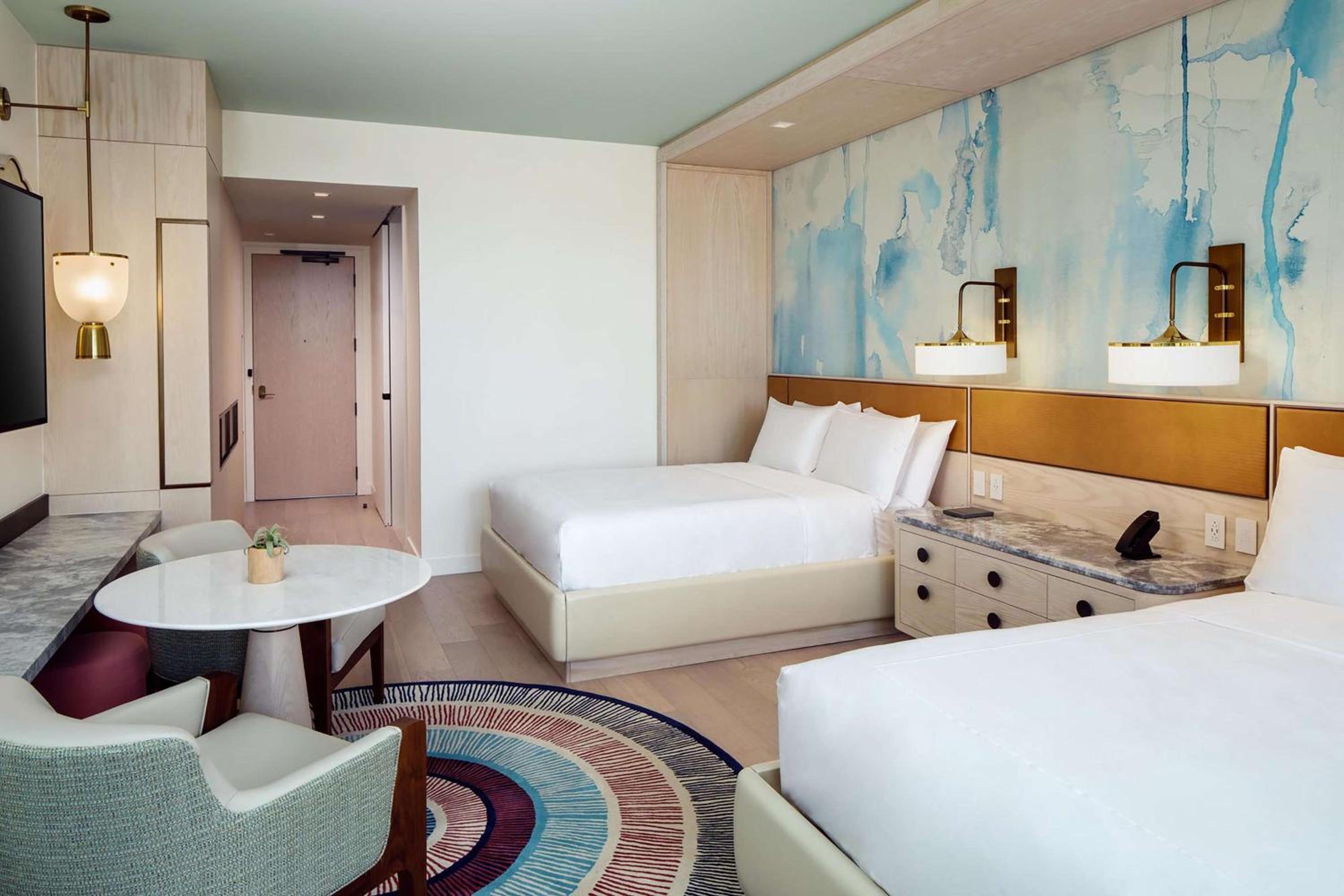 Queen Room With Two Queen Beds And Pool View