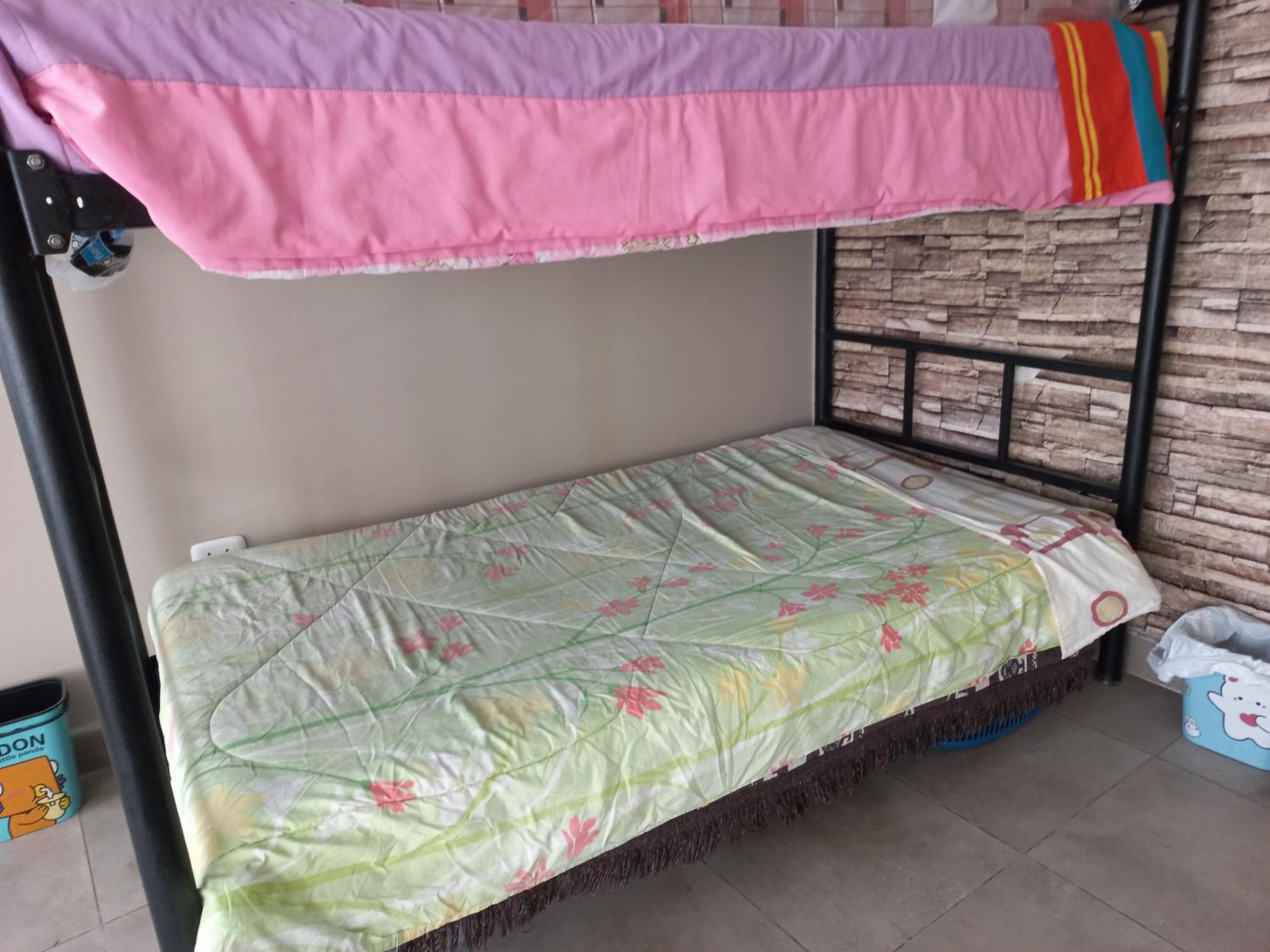 Single Bed In Dormitory Room