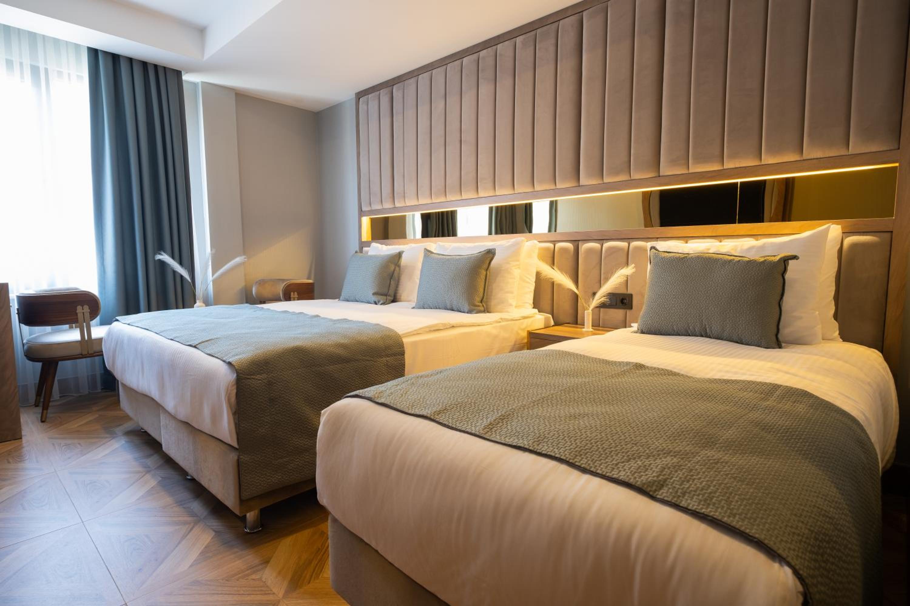 Deluxe Dreibettzimmer