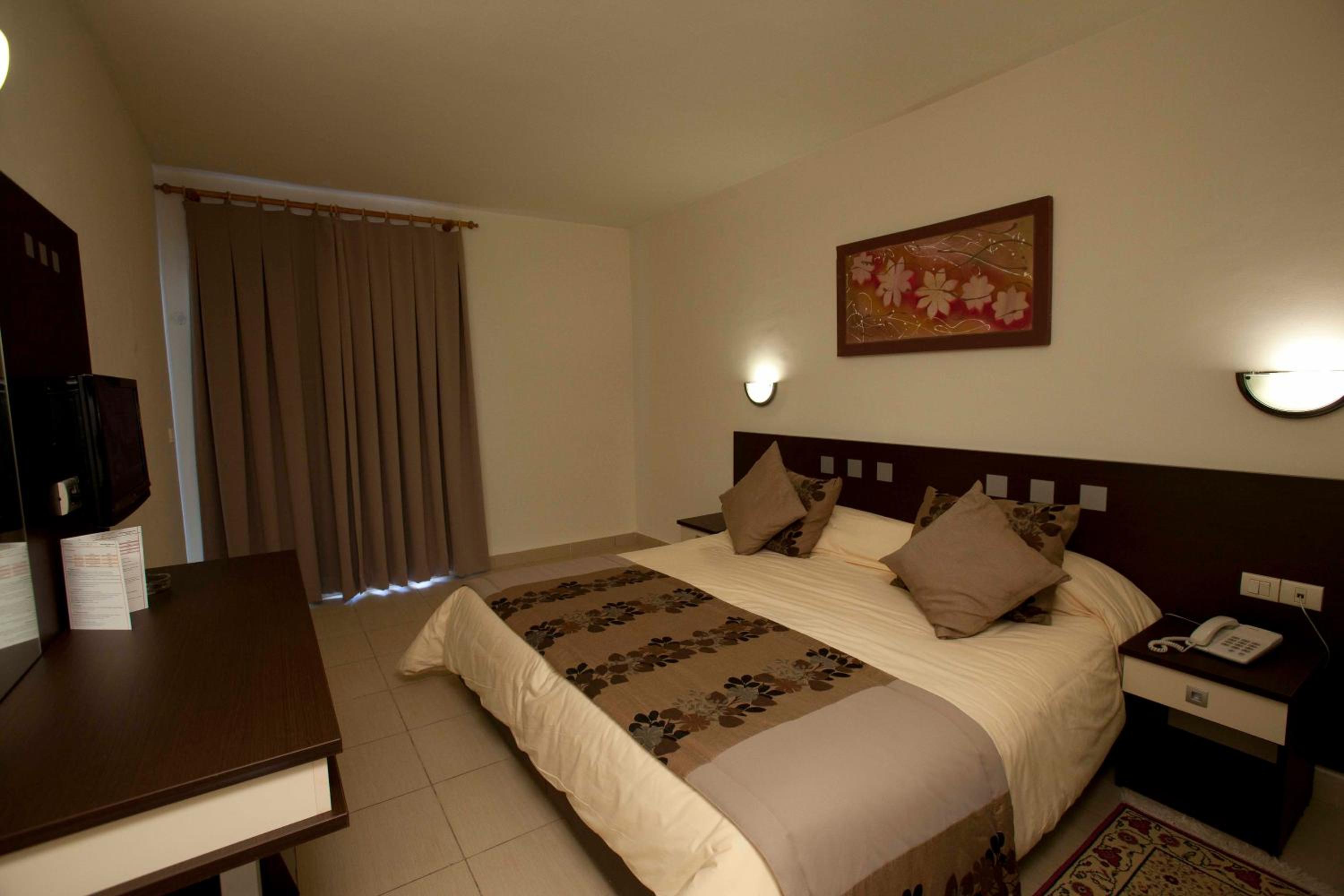 Quarto Quádruplo com Vista para o Jardim