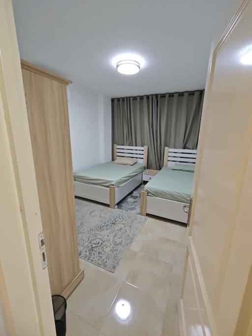 Three-Bedroom Apartment photo 1