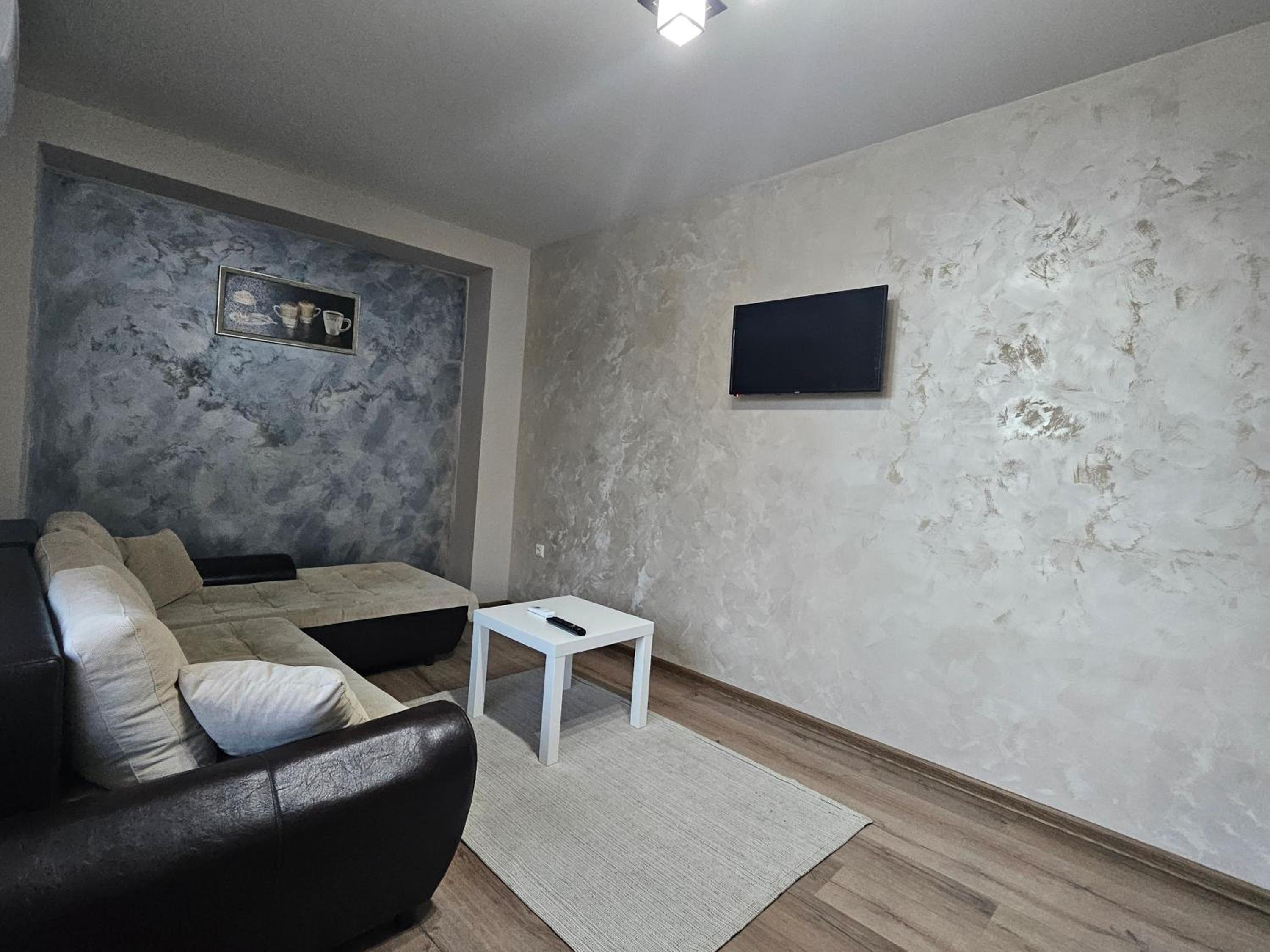 Three-Bedroom Apartment - Photo 1