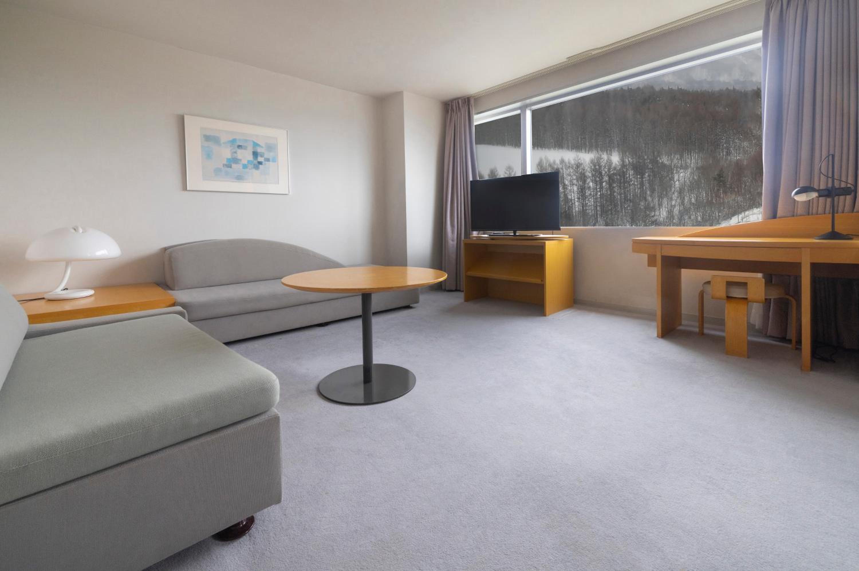 Premium Room with Three Single Beds and Two Single Sofa Beds - Photo 4