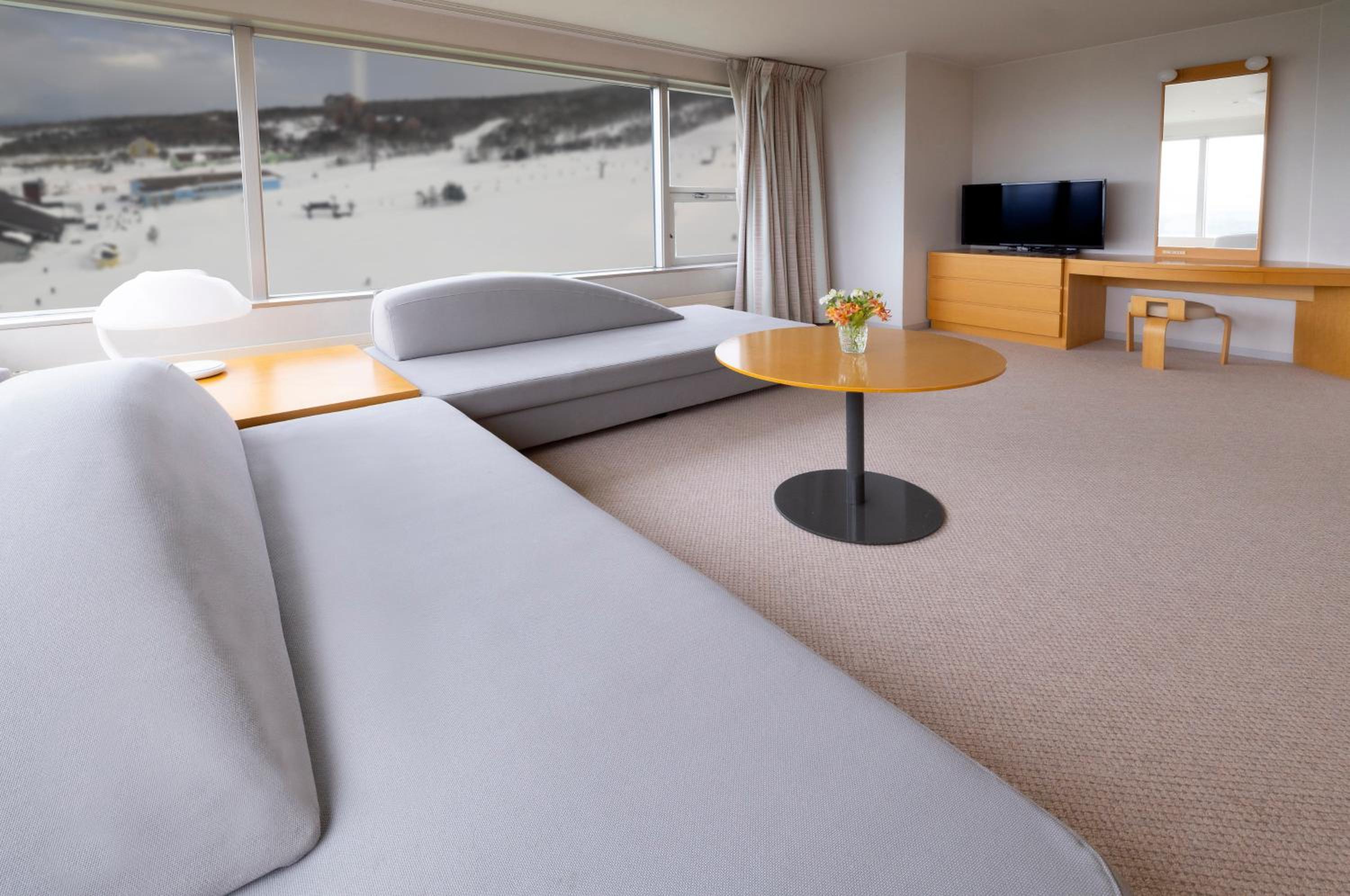 One-Bedroom Premium Twin Suite with Sofa Beds - Photo 1