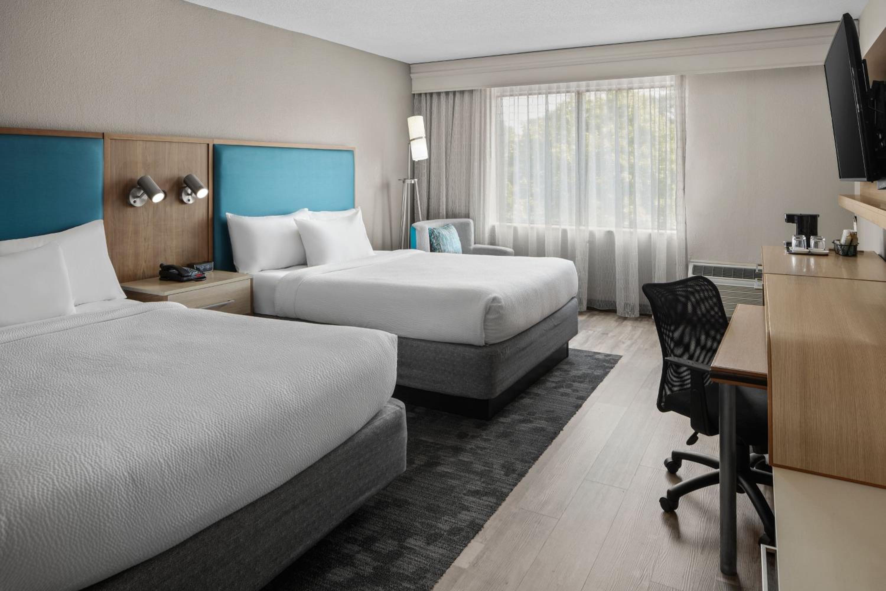 Queen Room with Two Queen Beds - Photo 1