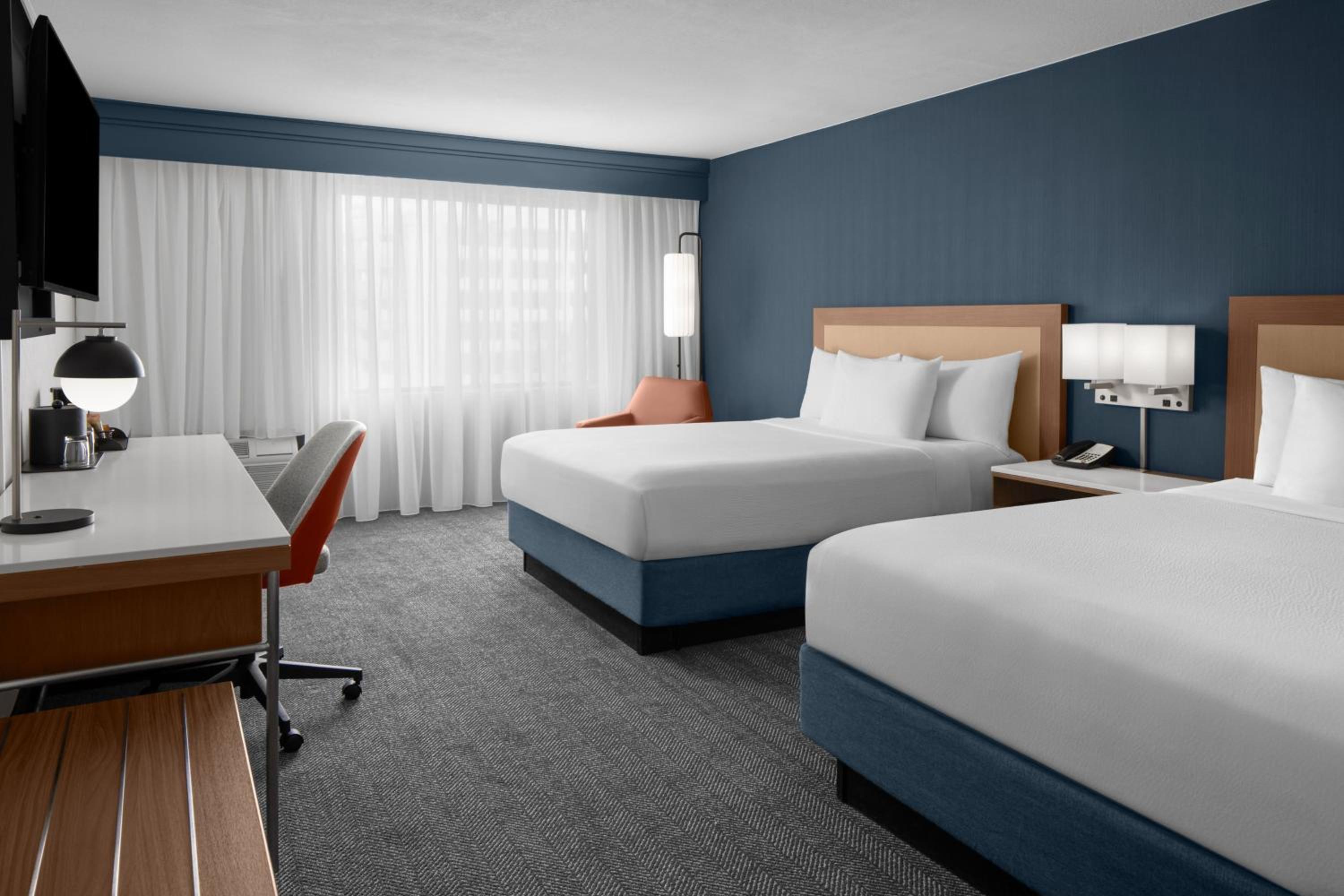 Queen Room with Two Queen Beds - Photo 7