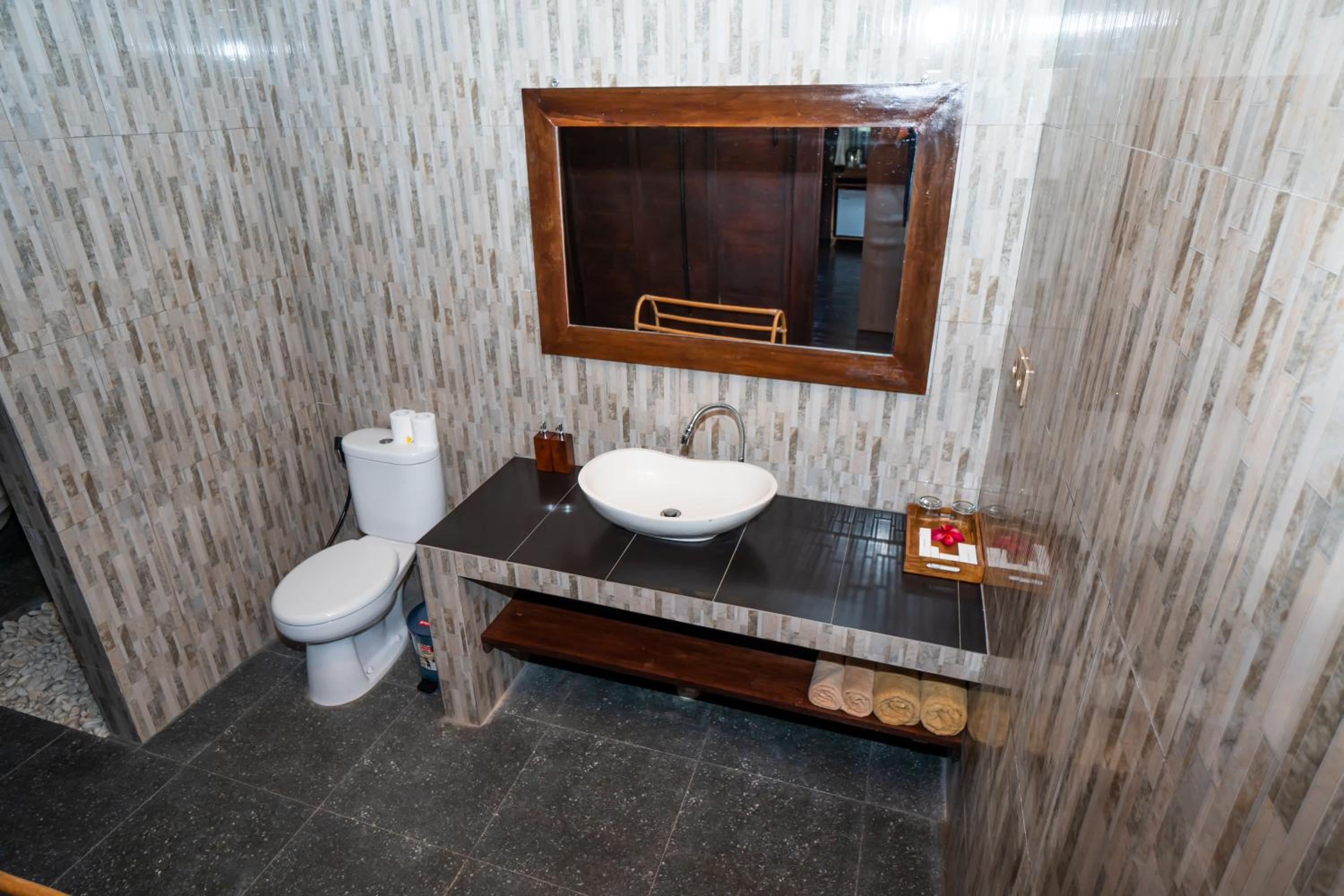 Deluxe Room - Photo 11