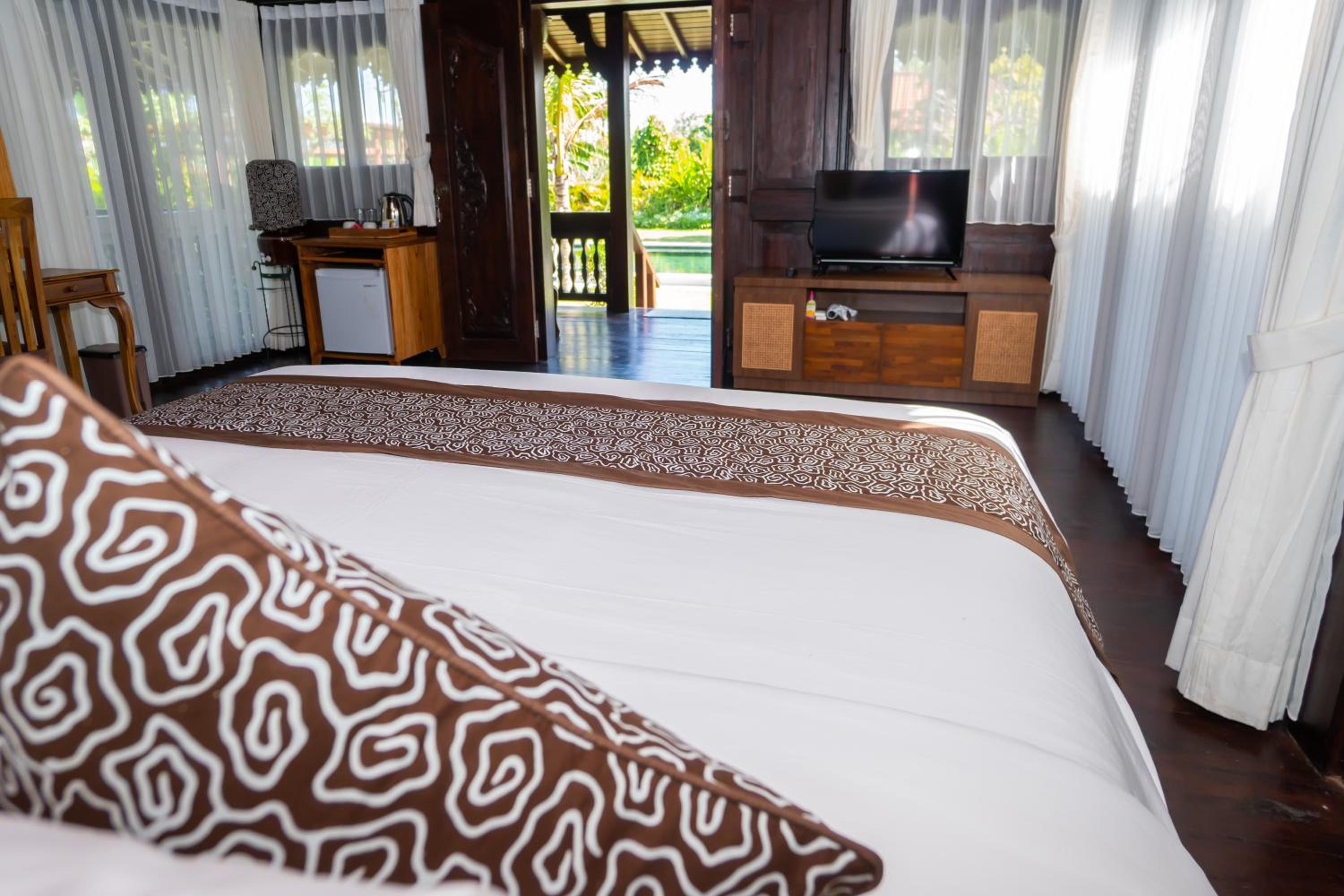 Deluxe Room - Photo 16